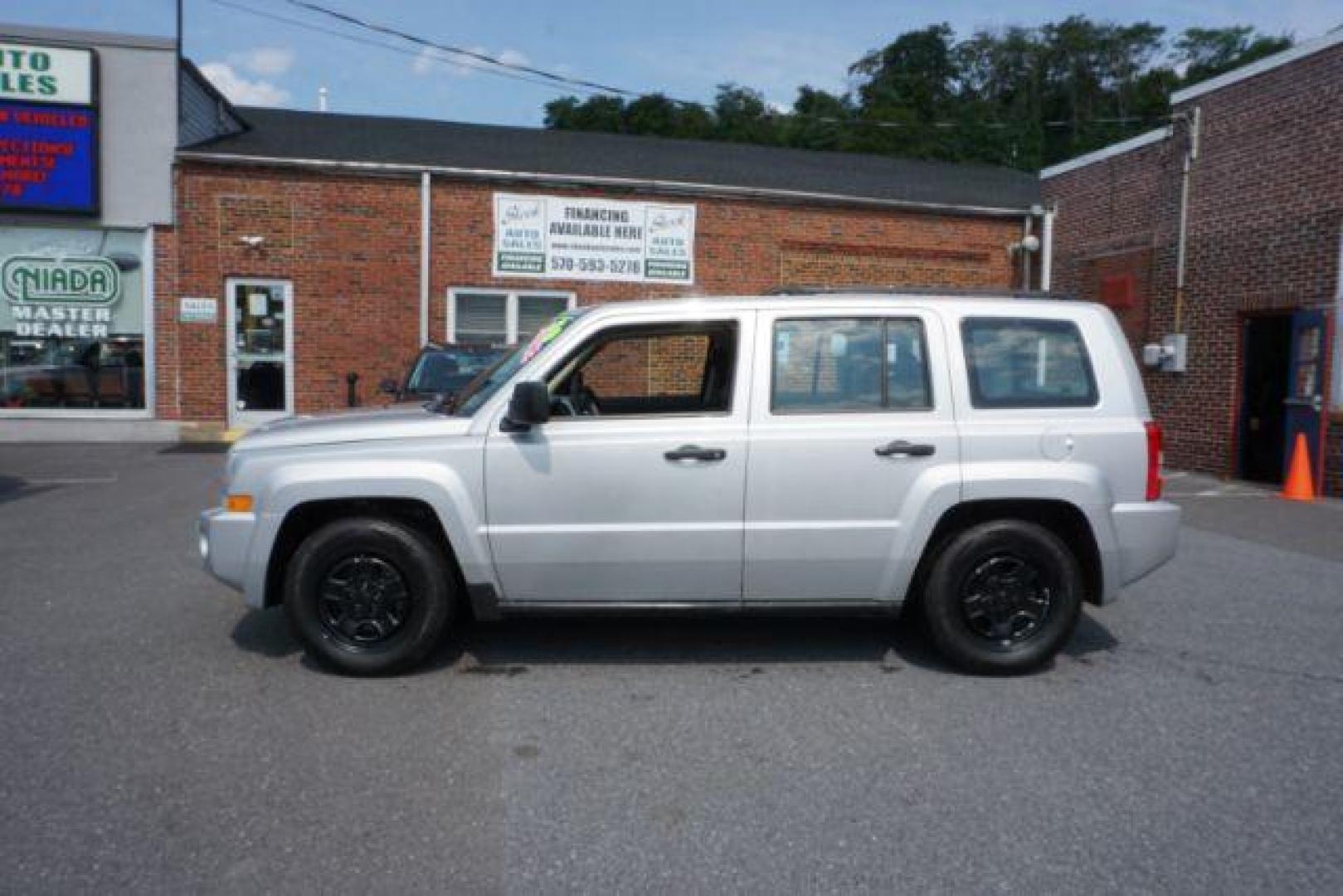 2008 Bright Silver Metallic Jeep Patriot Sport 4WD (1J8FF28WX8D) with an 2.4L L4 DOHC 16V engine, Continuously Variable Transmission transmission, located at 312 Centre Ave, Schuylkill Haven, PA, 17972, (570) 593-5278, 40.638130, -76.177383 - Photo#0