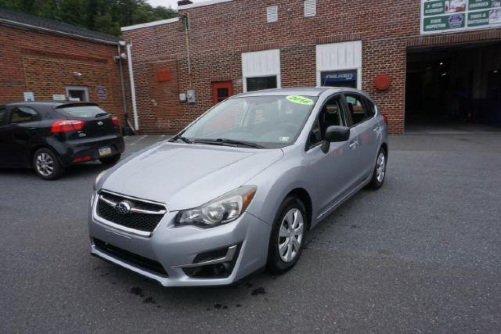 2016 Ice Silver Metallic Subaru Impreza 2.0i PZEV CVT 5-Door (JF1GPAA68G8) with an 2.0L H4 DOHC 16V engine, Continuously Variable Transmission transmission, located at 312 Centre Ave, Schuylkill Haven, PA, 17972, (570) 593-5278, 40.638130, -76.177383 - Photo#2