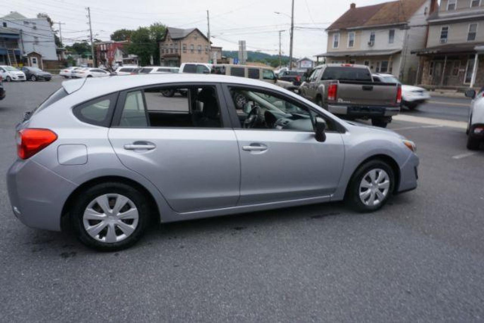 2016 Ice Silver Metallic Subaru Impreza 2.0i PZEV CVT 5-Door (JF1GPAA68G8) with an 2.0L H4 DOHC 16V engine, Continuously Variable Transmission transmission, located at 312 Centre Ave, Schuylkill Haven, PA, 17972, (570) 593-5278, 40.638130, -76.177383 - Photo#7