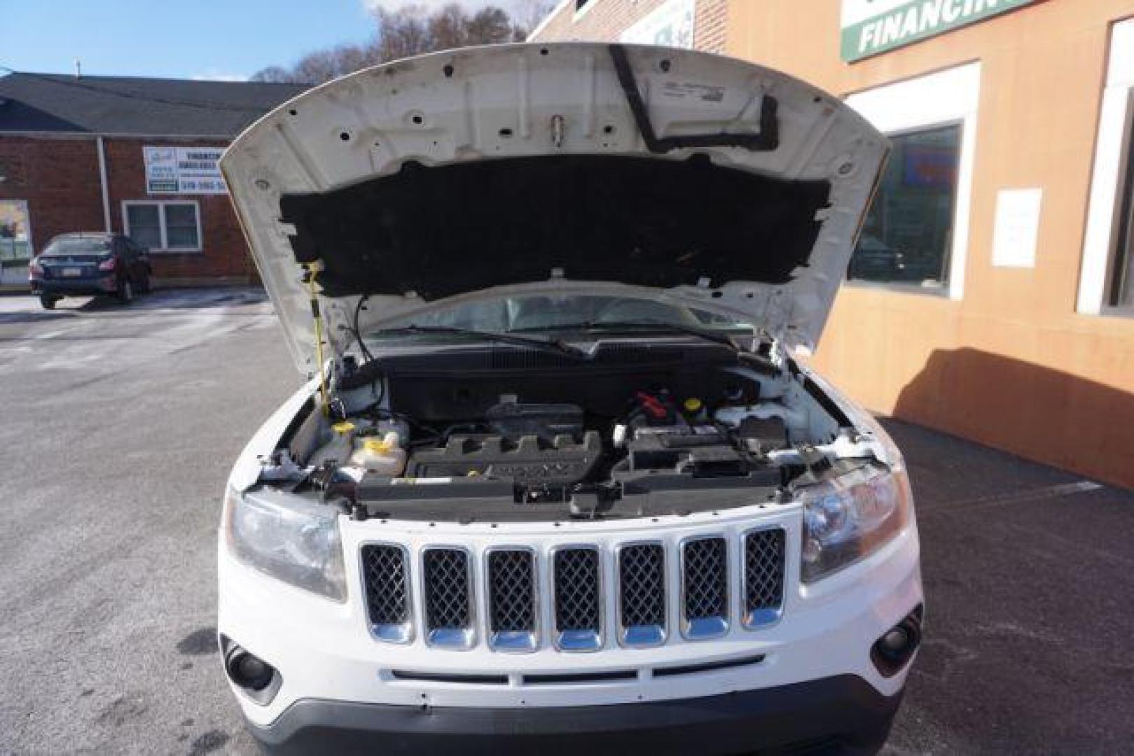 2016 White Jeep Compass Latitude 4WD (1C4NJDEB3GD) with an 2.4L L4 DOHC 16V engine, 6-Speed Automatic transmission, located at 312 Centre Ave, Schuylkill Haven, PA, 17972, (570) 593-5278, 40.638130, -76.177383 - Photo#58