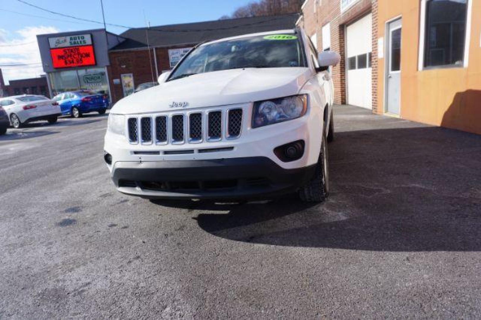 2016 White Jeep Compass Latitude 4WD (1C4NJDEB3GD) with an 2.4L L4 DOHC 16V engine, 6-Speed Automatic transmission, located at 312 Centre Ave, Schuylkill Haven, PA, 17972, (570) 593-5278, 40.638130, -76.177383 - Photo#5