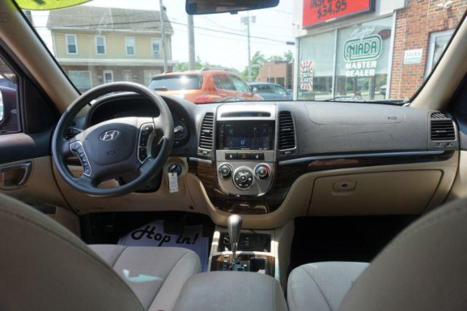 2011 Sonoran Red Hyundai Santa Fe GL 2.4 4WD (5XYZGDAB0BG) with an 2.4L L4 DOHC 16V engine, 6-Speed Automatic transmission, located at 312 Centre Ave, Schuylkill Haven, PA, 17972, (570) 593-5278, 40.638130, -76.177383 - Photo#41