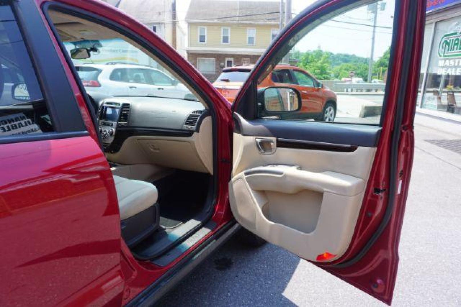 2011 Sonoran Red Hyundai Santa Fe GL 2.4 4WD (5XYZGDAB0BG) with an 2.4L L4 DOHC 16V engine, 6-Speed Automatic transmission, located at 312 Centre Ave, Schuylkill Haven, PA, 17972, (570) 593-5278, 40.638130, -76.177383 - Photo#42