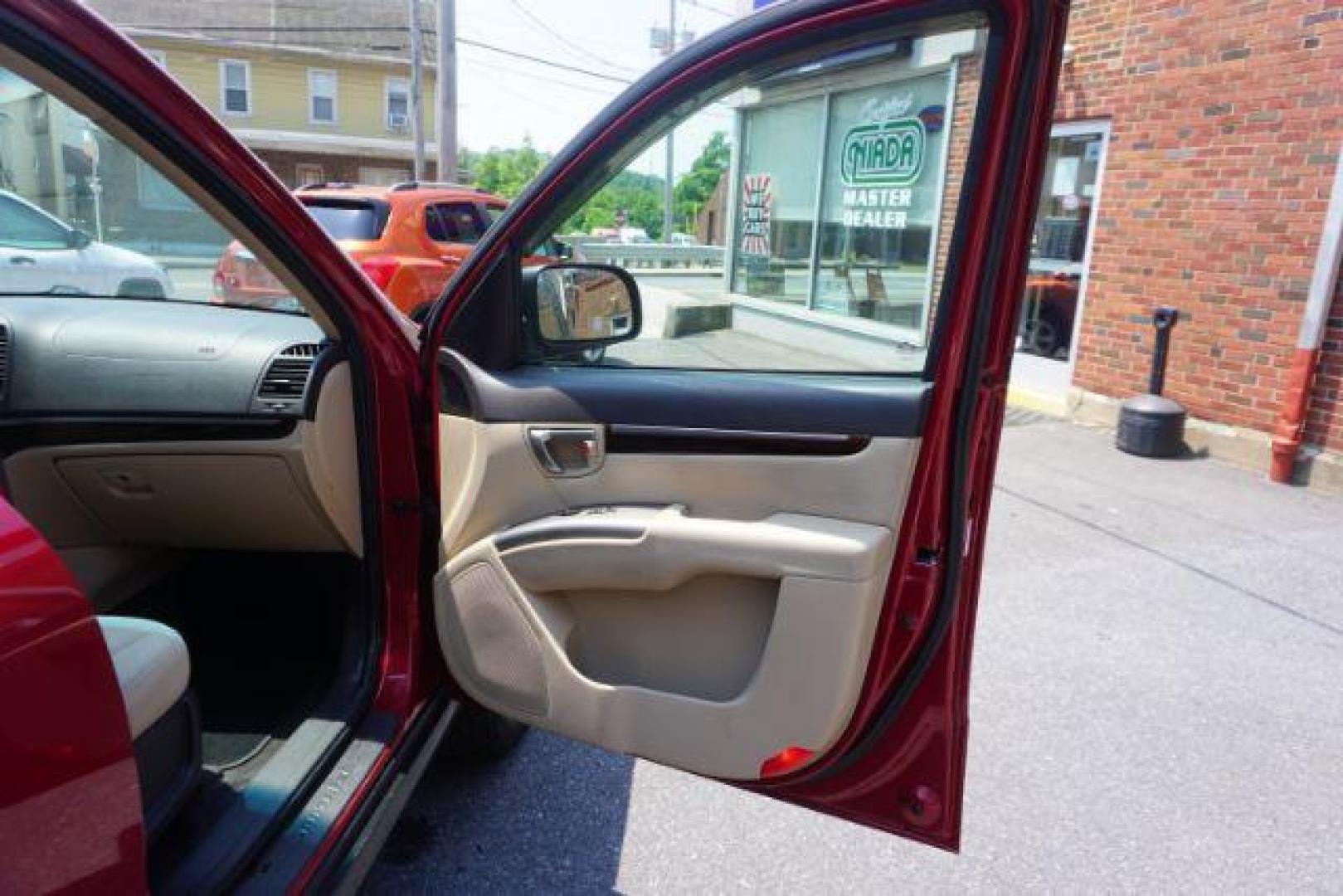 2011 Sonoran Red Hyundai Santa Fe GL 2.4 4WD (5XYZGDAB0BG) with an 2.4L L4 DOHC 16V engine, 6-Speed Automatic transmission, located at 312 Centre Ave, Schuylkill Haven, PA, 17972, (570) 593-5278, 40.638130, -76.177383 - Photo#43