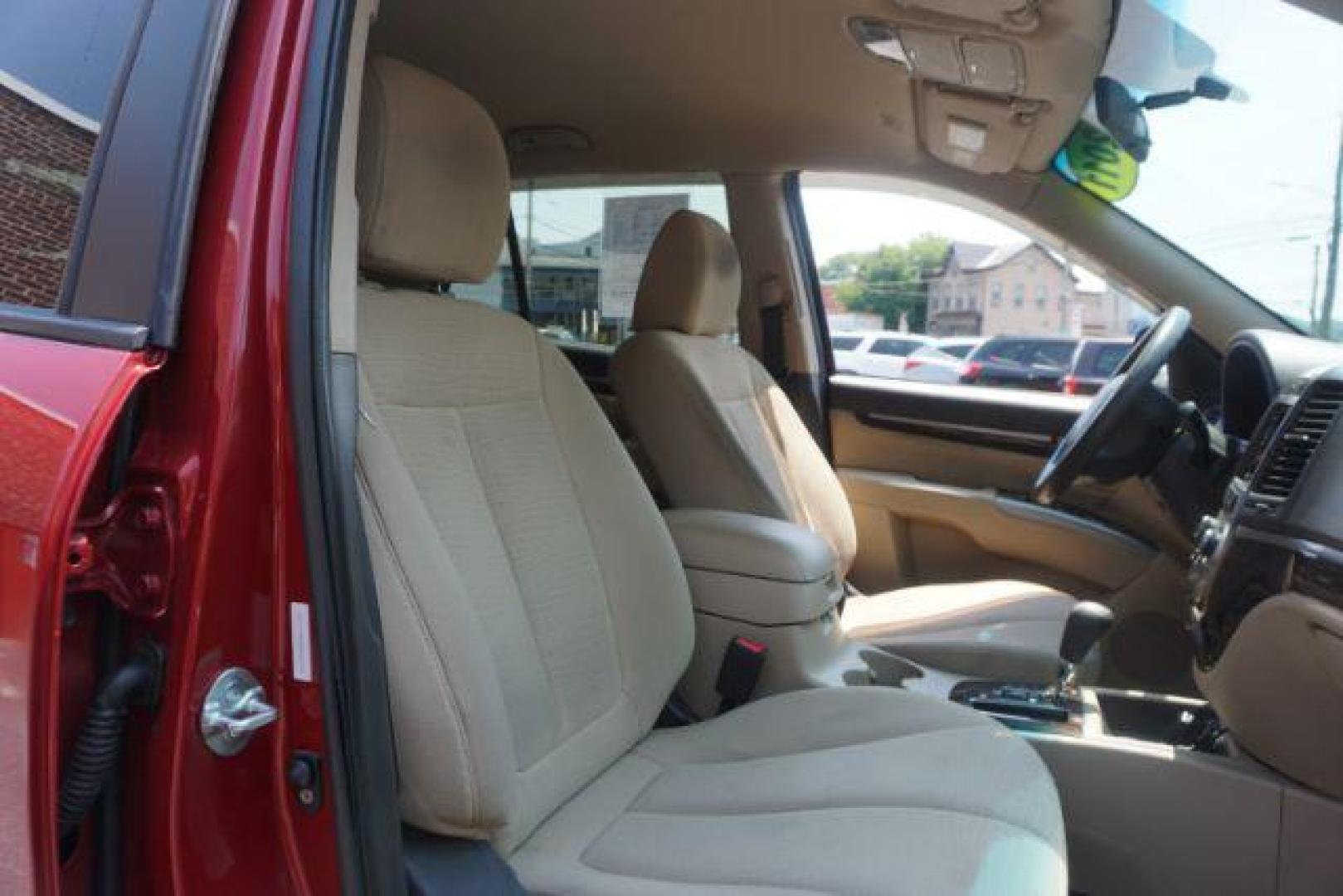 2011 Sonoran Red Hyundai Santa Fe GL 2.4 4WD (5XYZGDAB0BG) with an 2.4L L4 DOHC 16V engine, 6-Speed Automatic transmission, located at 312 Centre Ave, Schuylkill Haven, PA, 17972, (570) 593-5278, 40.638130, -76.177383 - Photo#47