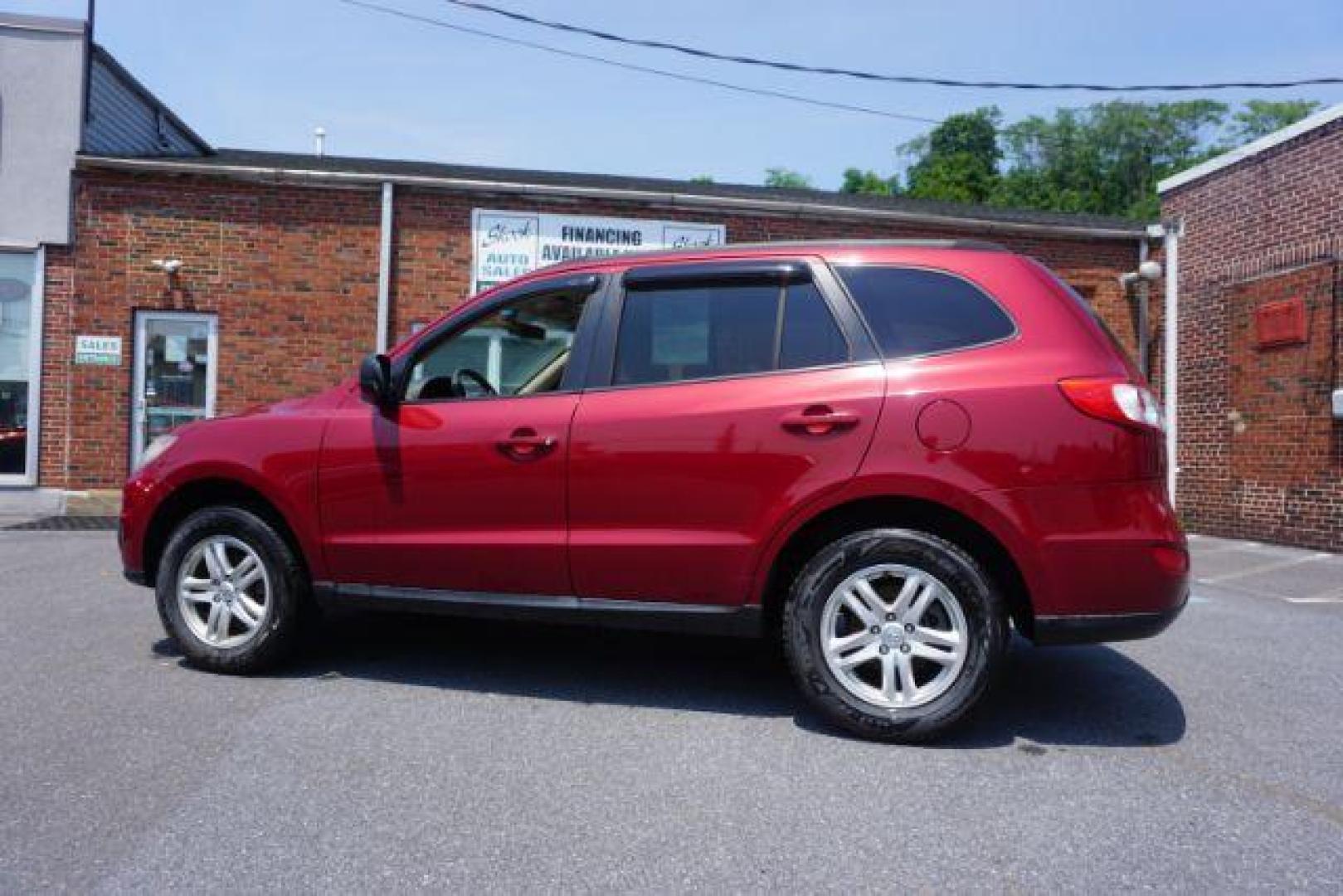 2011 Sonoran Red Hyundai Santa Fe GL 2.4 4WD (5XYZGDAB0BG) with an 2.4L L4 DOHC 16V engine, 6-Speed Automatic transmission, located at 312 Centre Ave, Schuylkill Haven, PA, 17972, (570) 593-5278, 40.638130, -76.177383 - Photo#13