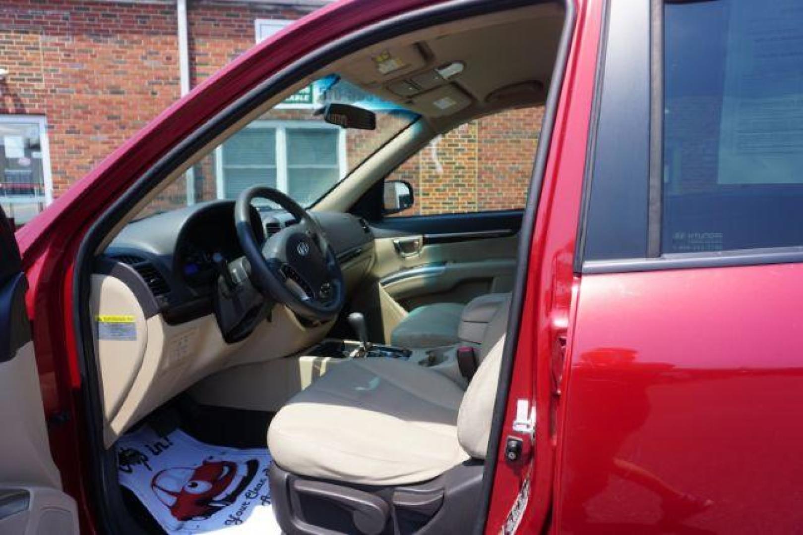 2011 Sonoran Red Hyundai Santa Fe GL 2.4 4WD (5XYZGDAB0BG) with an 2.4L L4 DOHC 16V engine, 6-Speed Automatic transmission, located at 312 Centre Ave, Schuylkill Haven, PA, 17972, (570) 593-5278, 40.638130, -76.177383 - Photo#17