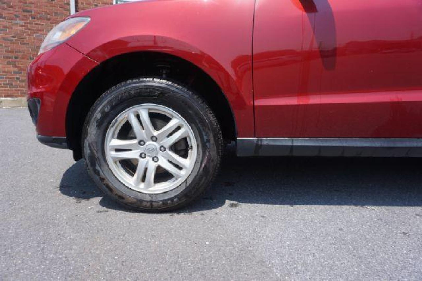 2011 Sonoran Red Hyundai Santa Fe GL 2.4 4WD (5XYZGDAB0BG) with an 2.4L L4 DOHC 16V engine, 6-Speed Automatic transmission, located at 312 Centre Ave, Schuylkill Haven, PA, 17972, (570) 593-5278, 40.638130, -76.177383 - Photo#1