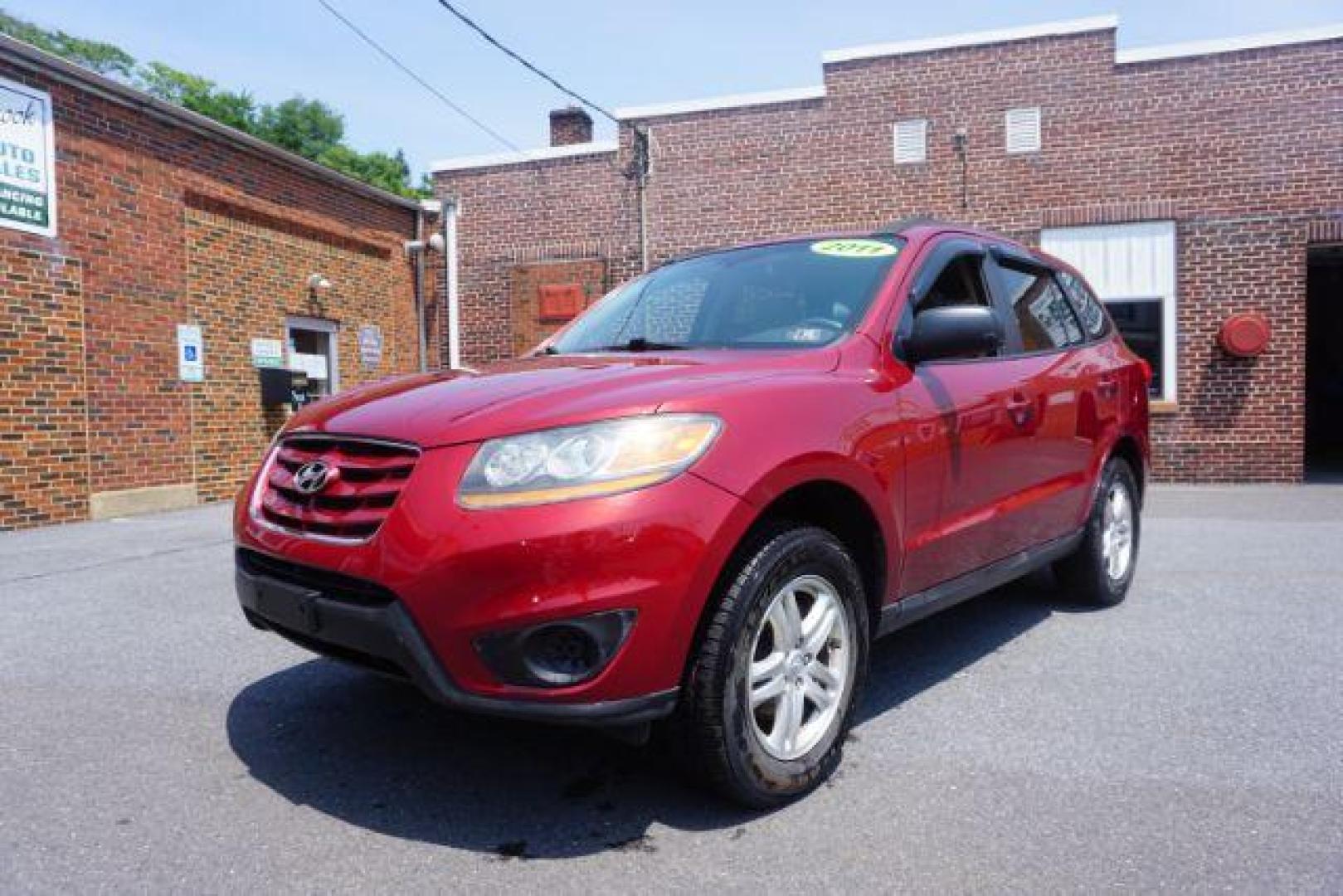 2011 Sonoran Red Hyundai Santa Fe GL 2.4 4WD (5XYZGDAB0BG) with an 2.4L L4 DOHC 16V engine, 6-Speed Automatic transmission, located at 312 Centre Ave, Schuylkill Haven, PA, 17972, (570) 593-5278, 40.638130, -76.177383 - Photo#3