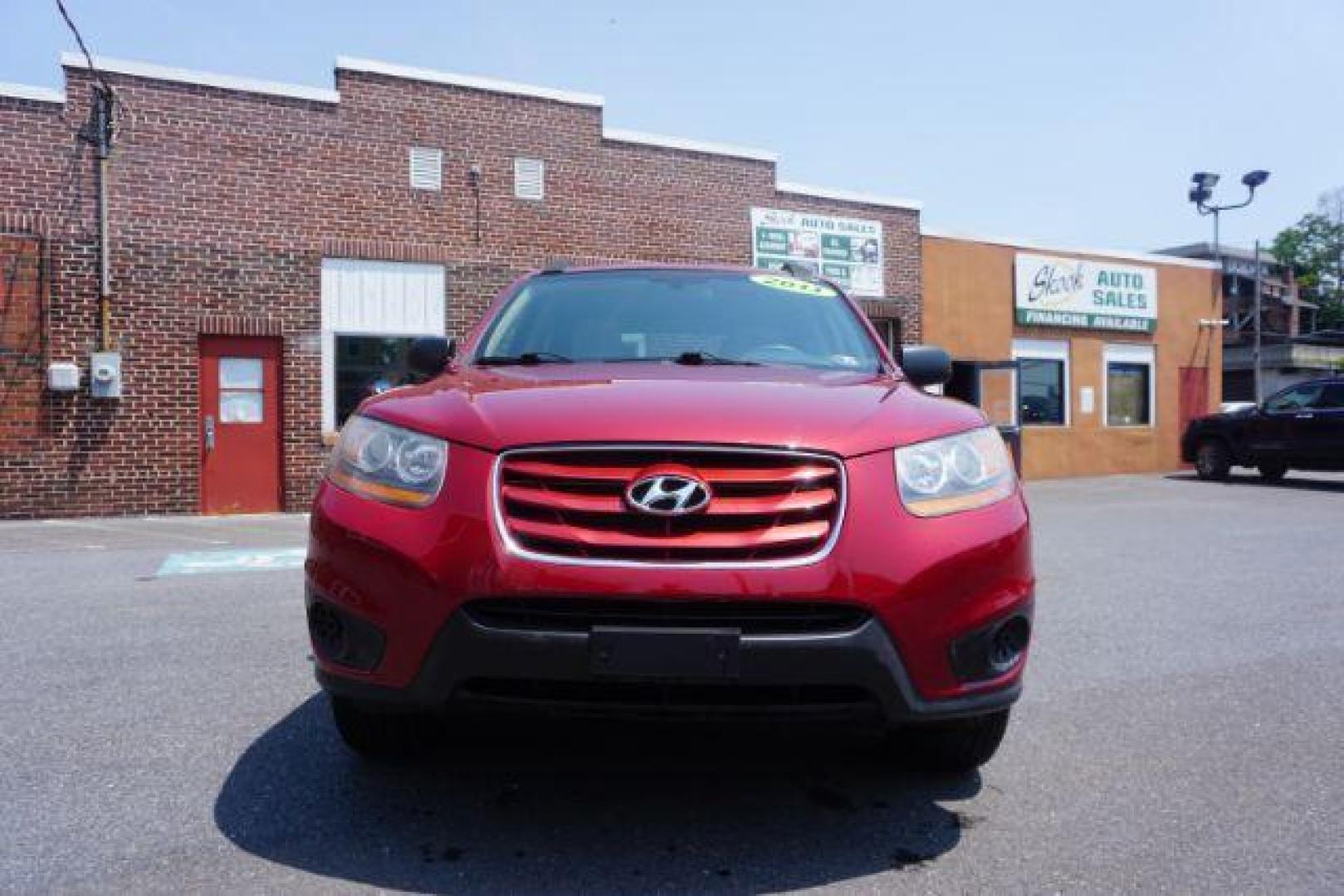 2011 Sonoran Red Hyundai Santa Fe GL 2.4 4WD (5XYZGDAB0BG) with an 2.4L L4 DOHC 16V engine, 6-Speed Automatic transmission, located at 312 Centre Ave, Schuylkill Haven, PA, 17972, (570) 593-5278, 40.638130, -76.177383 - Photo#4