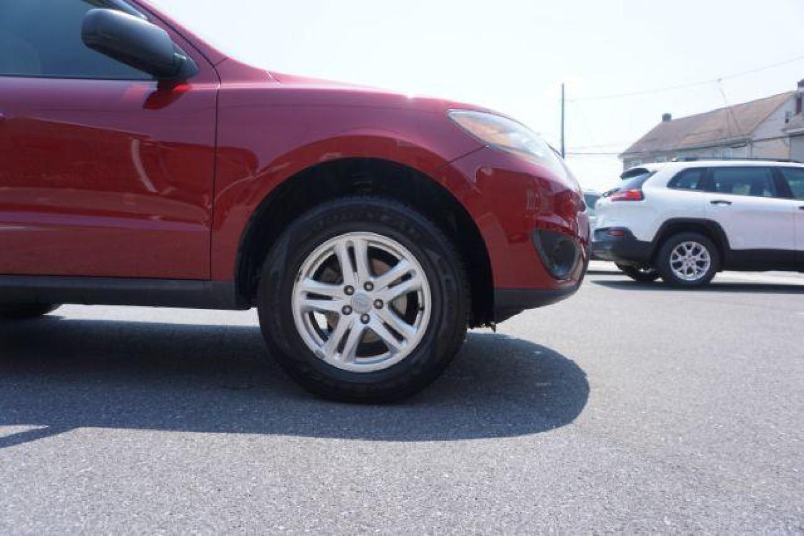 2011 Sonoran Red Hyundai Santa Fe GL 2.4 4WD (5XYZGDAB0BG) with an 2.4L L4 DOHC 16V engine, 6-Speed Automatic transmission, located at 312 Centre Ave, Schuylkill Haven, PA, 17972, (570) 593-5278, 40.638130, -76.177383 - Photo#6