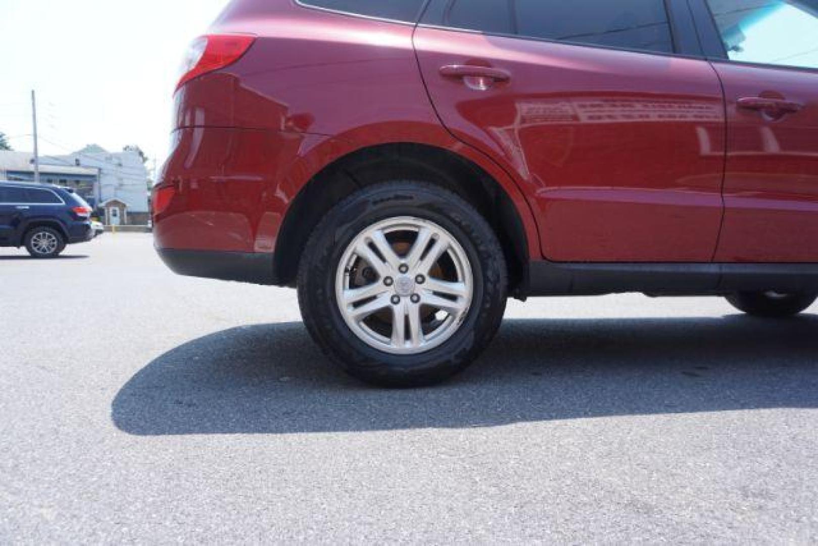 2011 Sonoran Red Hyundai Santa Fe GL 2.4 4WD (5XYZGDAB0BG) with an 2.4L L4 DOHC 16V engine, 6-Speed Automatic transmission, located at 312 Centre Ave, Schuylkill Haven, PA, 17972, (570) 593-5278, 40.638130, -76.177383 - Photo#7