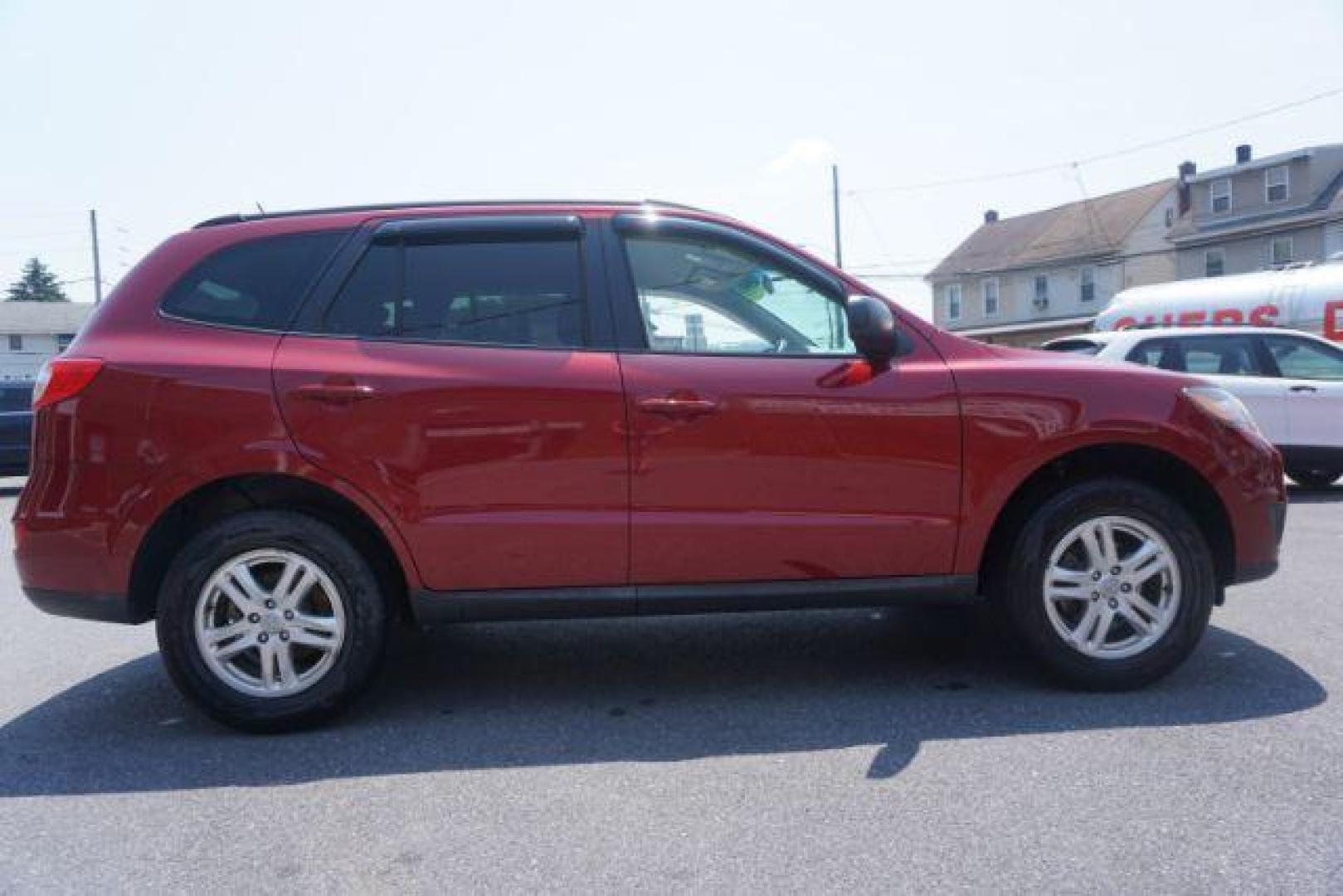 2011 Sonoran Red Hyundai Santa Fe GL 2.4 4WD (5XYZGDAB0BG) with an 2.4L L4 DOHC 16V engine, 6-Speed Automatic transmission, located at 312 Centre Ave, Schuylkill Haven, PA, 17972, (570) 593-5278, 40.638130, -76.177383 - Photo#8