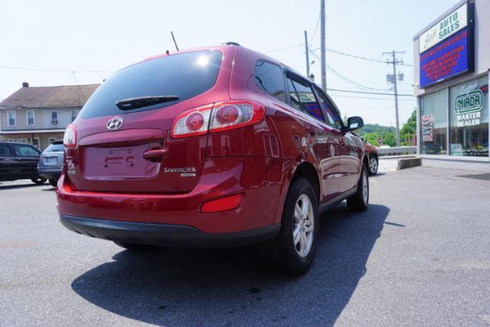 2011 Sonoran Red Hyundai Santa Fe GL 2.4 4WD (5XYZGDAB0BG) with an 2.4L L4 DOHC 16V engine, 6-Speed Automatic transmission, located at 312 Centre Ave, Schuylkill Haven, PA, 17972, (570) 593-5278, 40.638130, -76.177383 - Photo#9