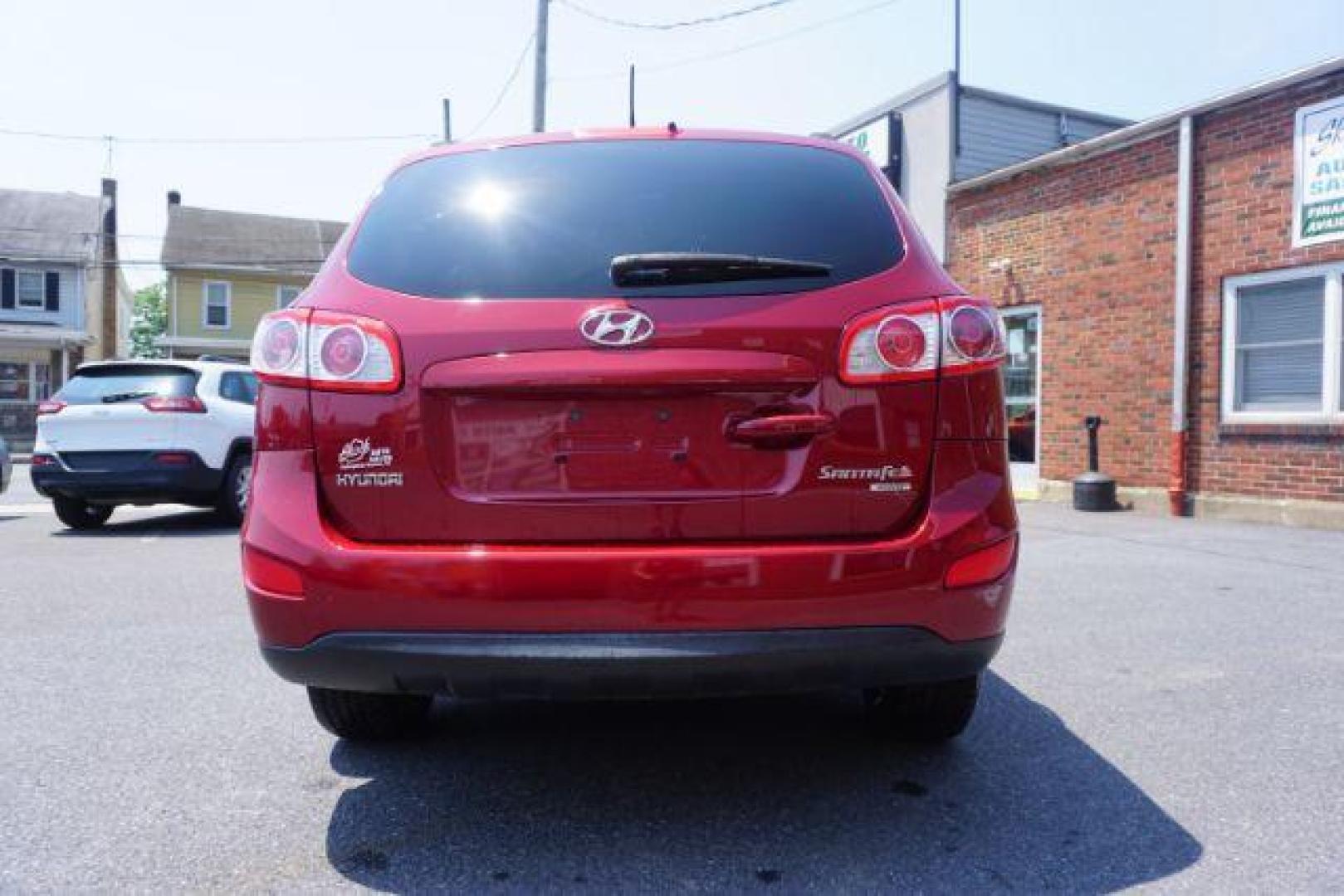 2011 Sonoran Red Hyundai Santa Fe GL 2.4 4WD (5XYZGDAB0BG) with an 2.4L L4 DOHC 16V engine, 6-Speed Automatic transmission, located at 312 Centre Ave, Schuylkill Haven, PA, 17972, (570) 593-5278, 40.638130, -76.177383 - Photo#10