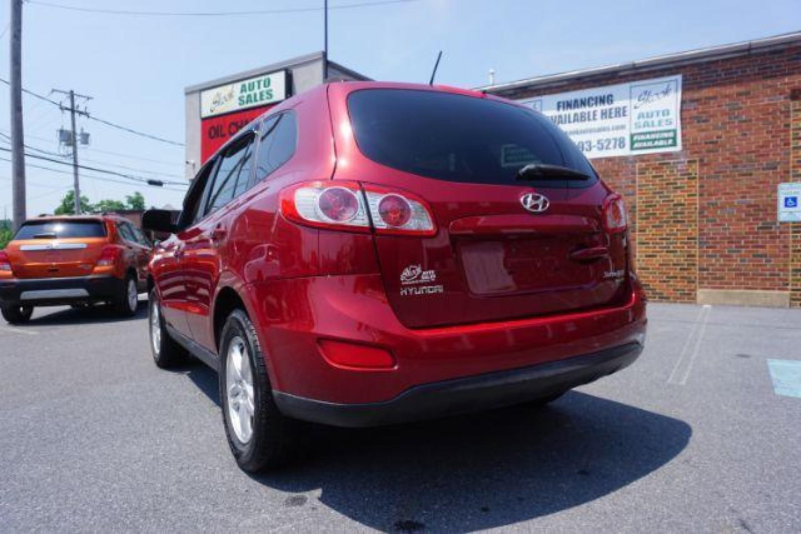 2011 Sonoran Red Hyundai Santa Fe GL 2.4 4WD (5XYZGDAB0BG) with an 2.4L L4 DOHC 16V engine, 6-Speed Automatic transmission, located at 312 Centre Ave, Schuylkill Haven, PA, 17972, (570) 593-5278, 40.638130, -76.177383 - Photo#11