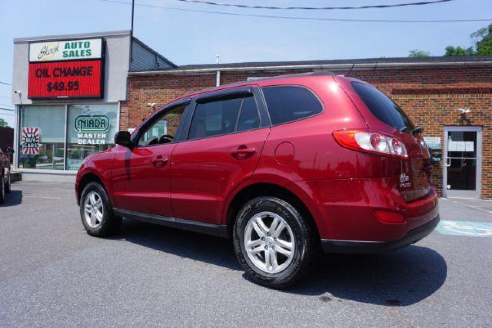 2011 Sonoran Red Hyundai Santa Fe GL 2.4 4WD (5XYZGDAB0BG) with an 2.4L L4 DOHC 16V engine, 6-Speed Automatic transmission, located at 312 Centre Ave, Schuylkill Haven, PA, 17972, (570) 593-5278, 40.638130, -76.177383 - Photo#12