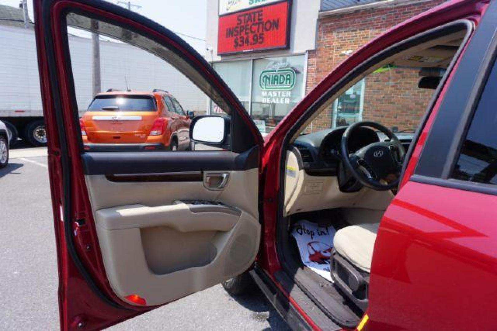 2011 Sonoran Red Hyundai Santa Fe GL 2.4 4WD (5XYZGDAB0BG) with an 2.4L L4 DOHC 16V engine, 6-Speed Automatic transmission, located at 312 Centre Ave, Schuylkill Haven, PA, 17972, (570) 593-5278, 40.638130, -76.177383 - Photo#14