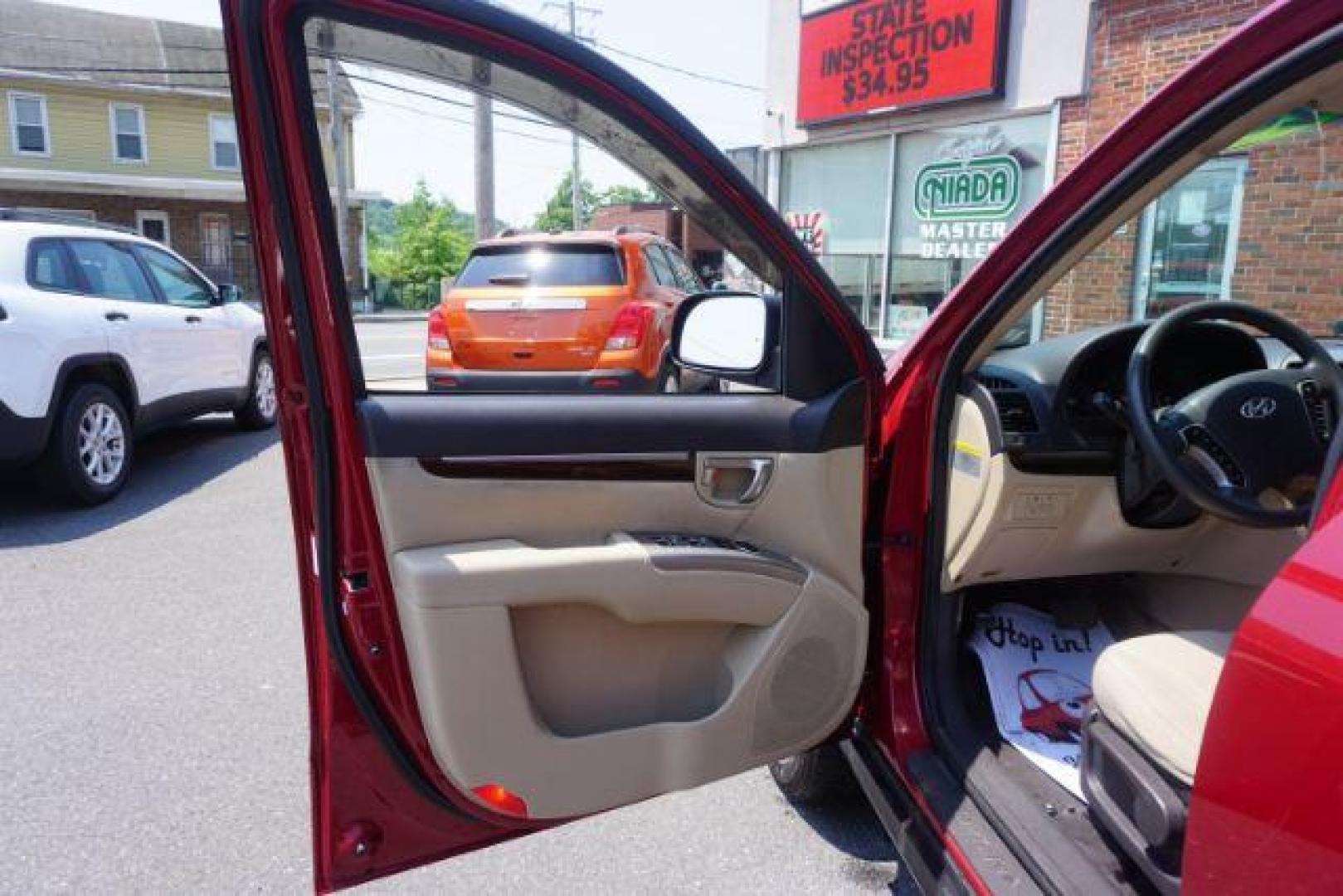 2011 Sonoran Red Hyundai Santa Fe GL 2.4 4WD (5XYZGDAB0BG) with an 2.4L L4 DOHC 16V engine, 6-Speed Automatic transmission, located at 312 Centre Ave, Schuylkill Haven, PA, 17972, (570) 593-5278, 40.638130, -76.177383 - Photo#15