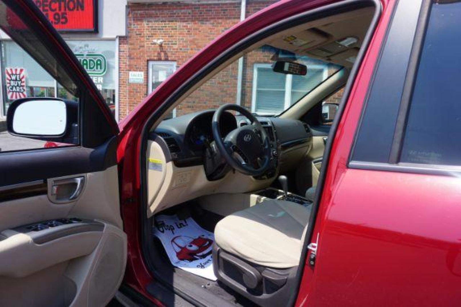 2011 Sonoran Red Hyundai Santa Fe GL 2.4 4WD (5XYZGDAB0BG) with an 2.4L L4 DOHC 16V engine, 6-Speed Automatic transmission, located at 312 Centre Ave, Schuylkill Haven, PA, 17972, (570) 593-5278, 40.638130, -76.177383 - Photo#16