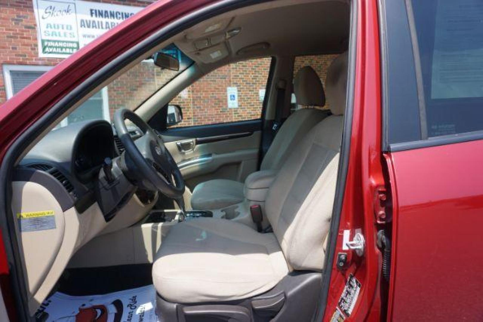 2011 Sonoran Red Hyundai Santa Fe GL 2.4 4WD (5XYZGDAB0BG) with an 2.4L L4 DOHC 16V engine, 6-Speed Automatic transmission, located at 312 Centre Ave, Schuylkill Haven, PA, 17972, (570) 593-5278, 40.638130, -76.177383 - Photo#18