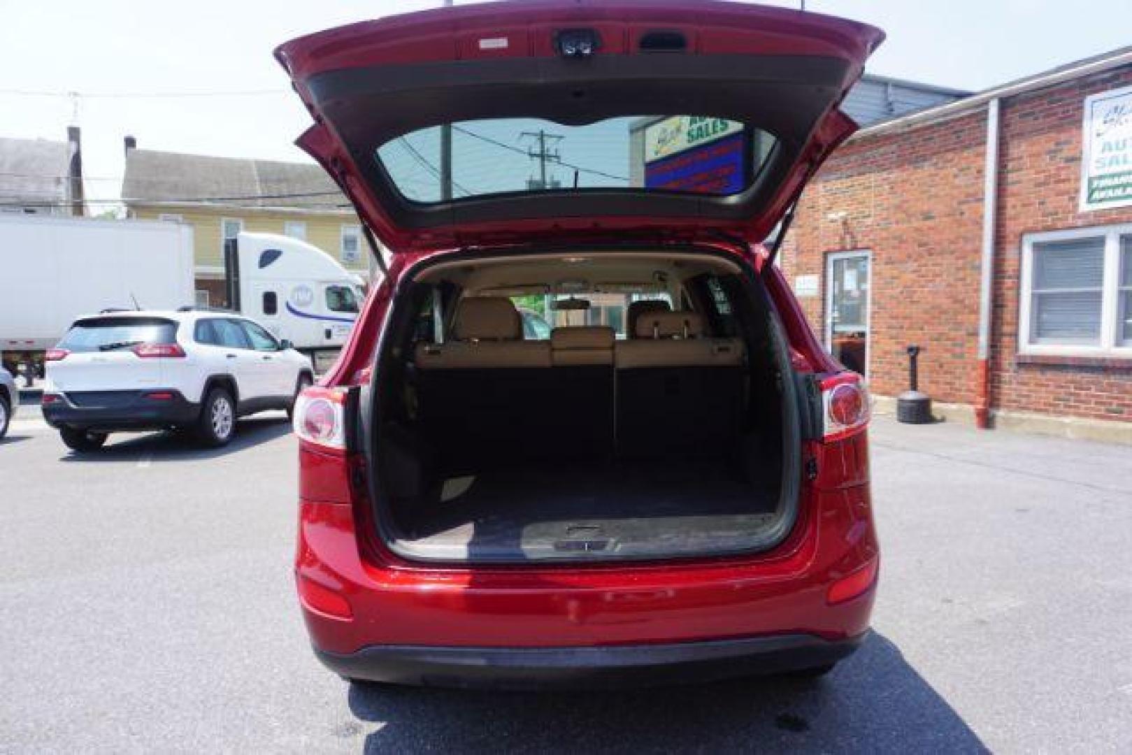 2011 Sonoran Red Hyundai Santa Fe GL 2.4 4WD (5XYZGDAB0BG) with an 2.4L L4 DOHC 16V engine, 6-Speed Automatic transmission, located at 312 Centre Ave, Schuylkill Haven, PA, 17972, (570) 593-5278, 40.638130, -76.177383 - Photo#34