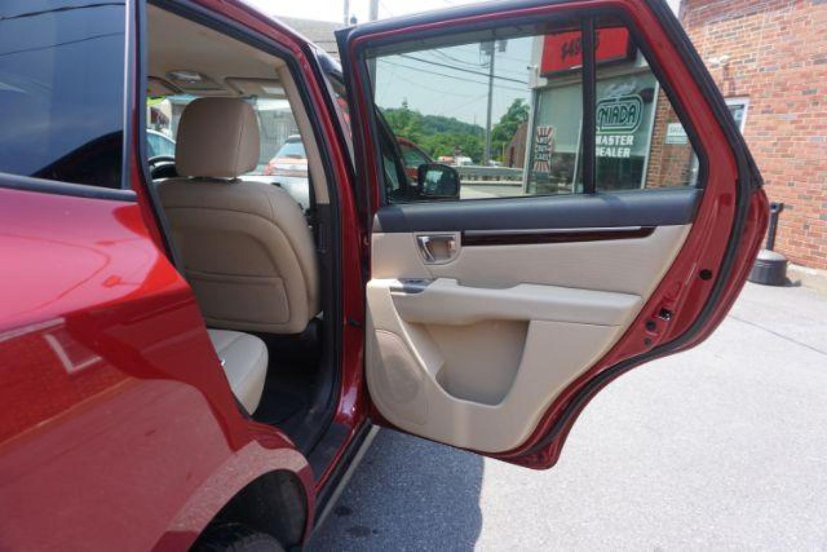 2011 Sonoran Red Hyundai Santa Fe GL 2.4 4WD (5XYZGDAB0BG) with an 2.4L L4 DOHC 16V engine, 6-Speed Automatic transmission, located at 312 Centre Ave, Schuylkill Haven, PA, 17972, (570) 593-5278, 40.638130, -76.177383 - Photo#36