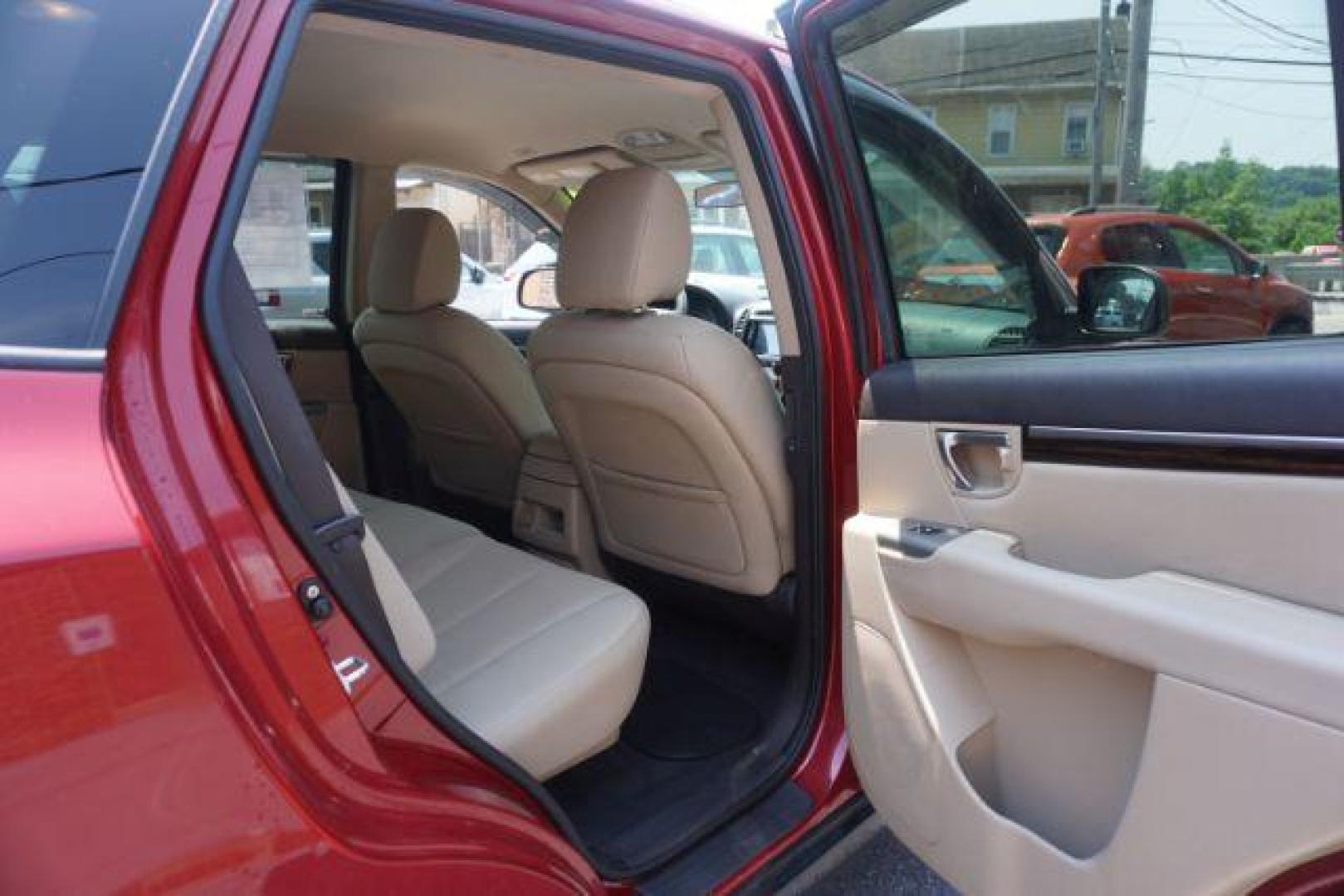 2011 Sonoran Red Hyundai Santa Fe GL 2.4 4WD (5XYZGDAB0BG) with an 2.4L L4 DOHC 16V engine, 6-Speed Automatic transmission, located at 312 Centre Ave, Schuylkill Haven, PA, 17972, (570) 593-5278, 40.638130, -76.177383 - Photo#37