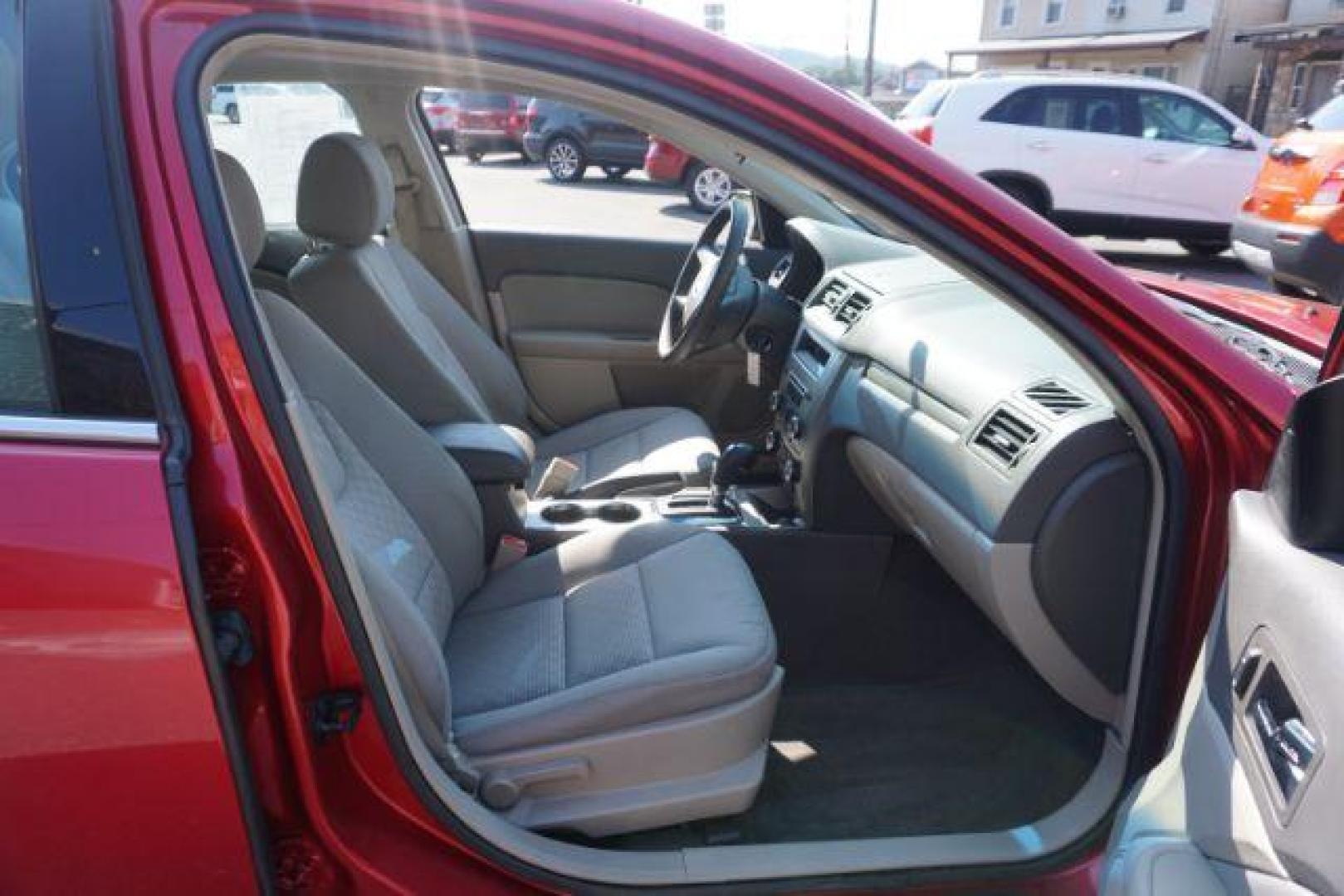 2012 Red Candy Metallic /Medium Light Stone C Ford Fusion SE (3FAHP0HA1CR) with an 2.5L L4 DOHC 16V engine, located at 312 Centre Ave, Schuylkill Haven, PA, 17972, (570) 593-5278, 40.638130, -76.177383 - Photo#49