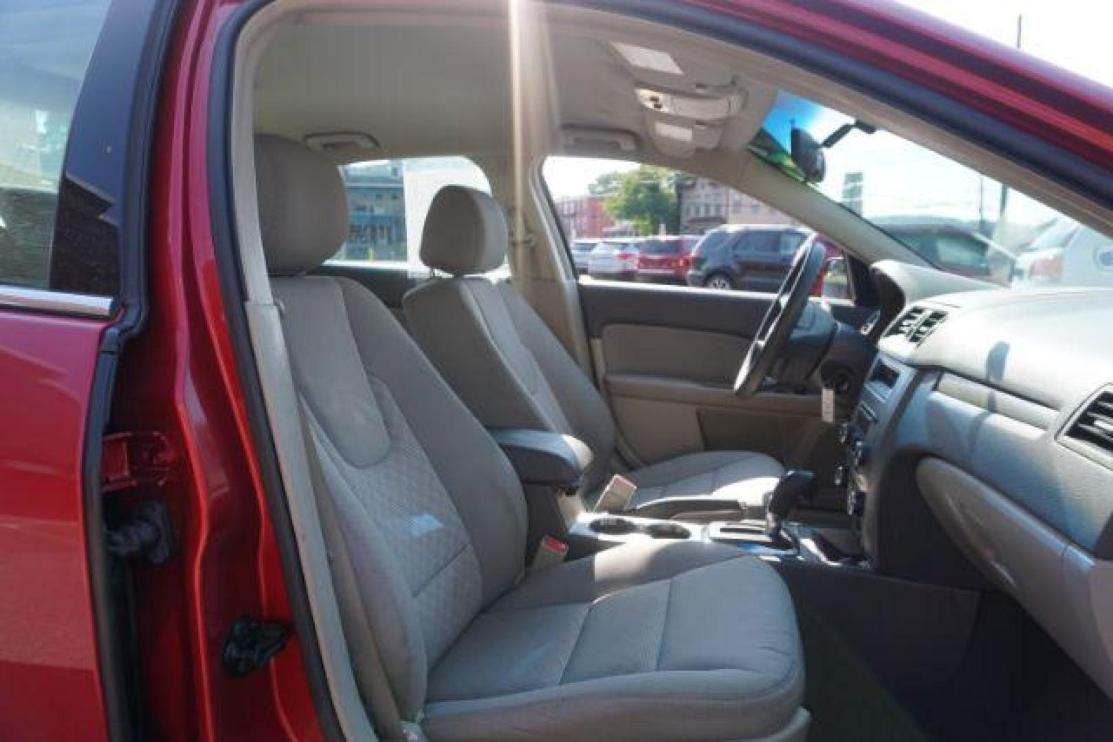 2012 Red Candy Metallic /Medium Light Stone C Ford Fusion SE (3FAHP0HA1CR) with an 2.5L L4 DOHC 16V engine, located at 312 Centre Ave, Schuylkill Haven, PA, 17972, (570) 593-5278, 40.638130, -76.177383 - Photo#50