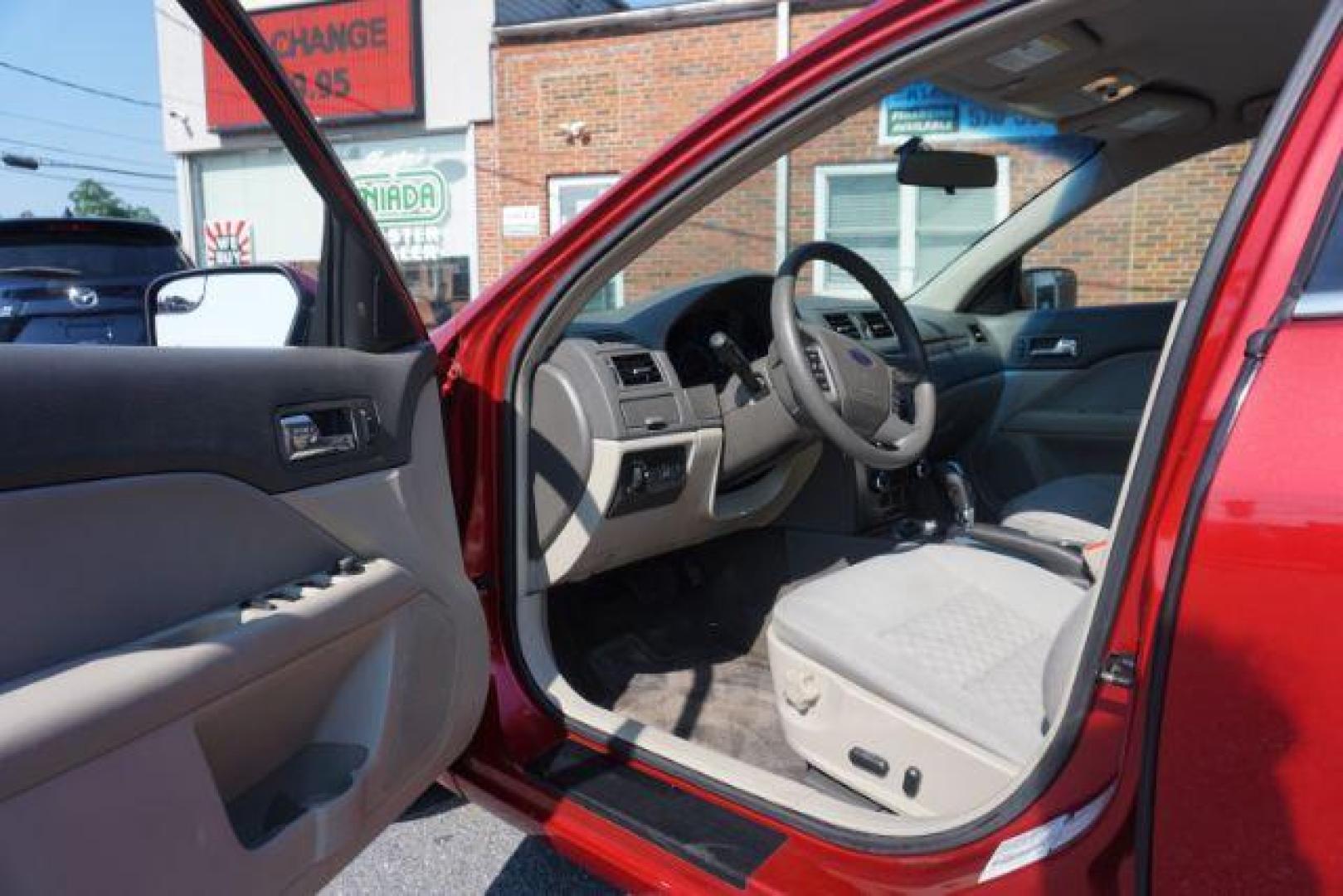 2012 Red Candy Metallic /Medium Light Stone C Ford Fusion SE (3FAHP0HA1CR) with an 2.5L L4 DOHC 16V engine, located at 312 Centre Ave, Schuylkill Haven, PA, 17972, (570) 593-5278, 40.638130, -76.177383 - Photo#17