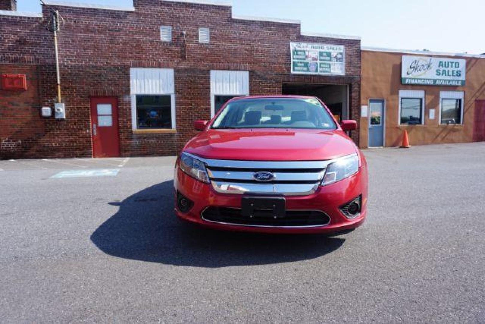 2012 Red Candy Metallic /Medium Light Stone C Ford Fusion SE (3FAHP0HA1CR) with an 2.5L L4 DOHC 16V engine, located at 312 Centre Ave, Schuylkill Haven, PA, 17972, (570) 593-5278, 40.638130, -76.177383 - Photo#2