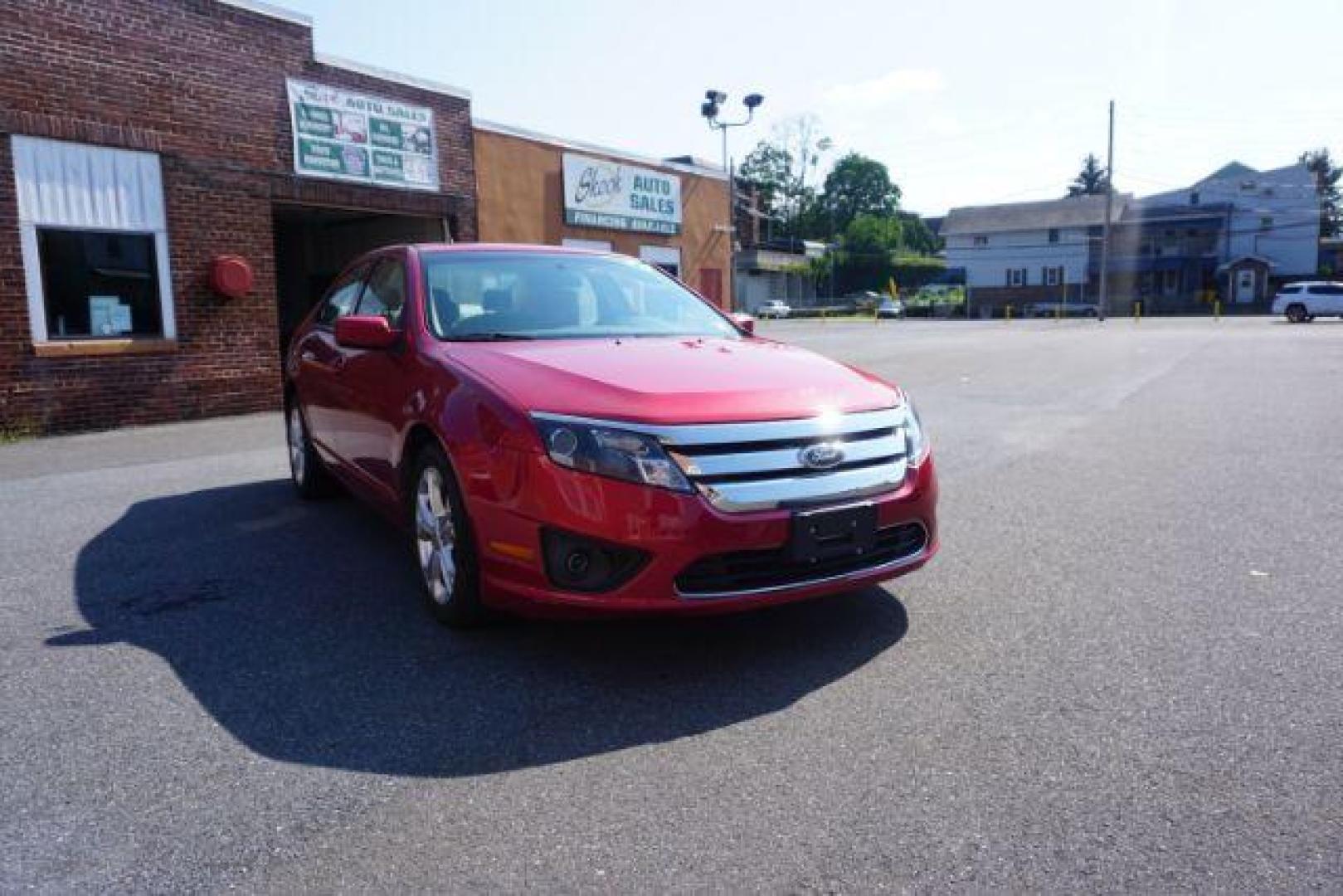 2012 Red Candy Metallic /Medium Light Stone C Ford Fusion SE (3FAHP0HA1CR) with an 2.5L L4 DOHC 16V engine, located at 312 Centre Ave, Schuylkill Haven, PA, 17972, (570) 593-5278, 40.638130, -76.177383 - Photo#3