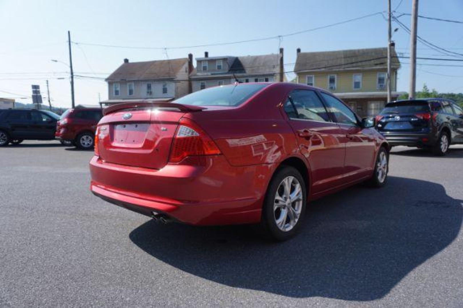 2012 Red Candy Metallic /Medium Light Stone C Ford Fusion SE (3FAHP0HA1CR) with an 2.5L L4 DOHC 16V engine, located at 312 Centre Ave, Schuylkill Haven, PA, 17972, (570) 593-5278, 40.638130, -76.177383 - Photo#8