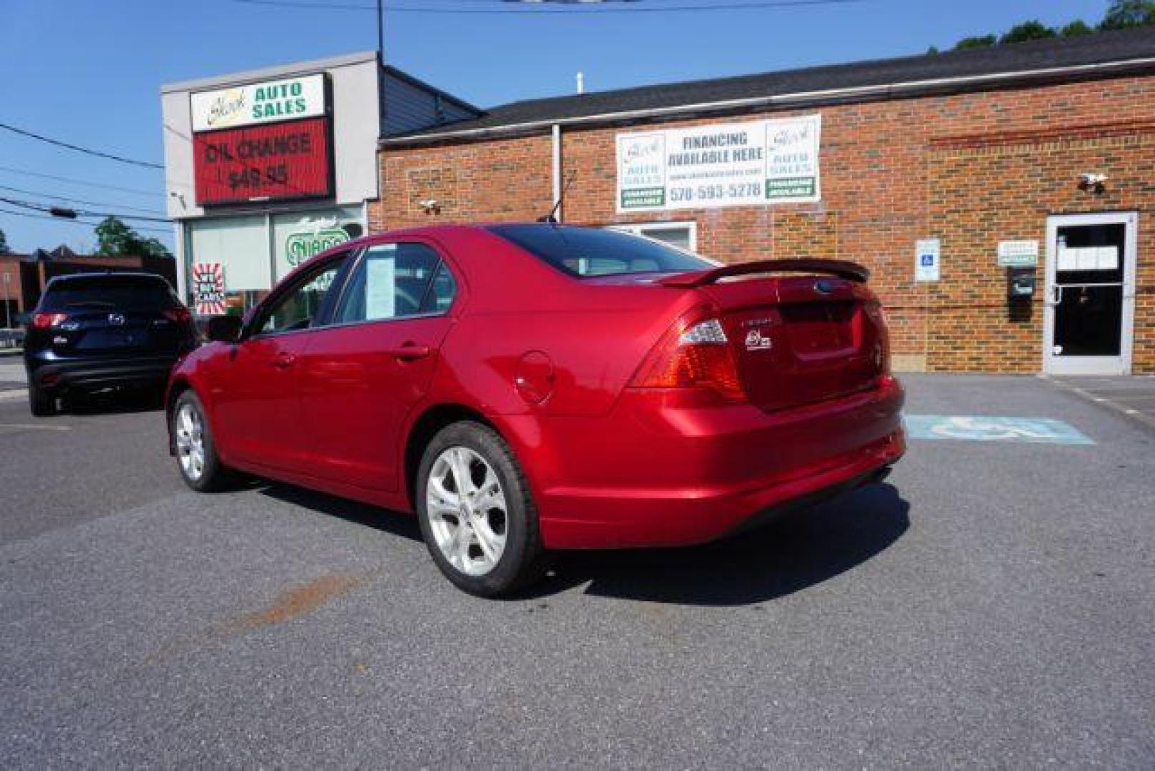 2012 Red Candy Metallic /Medium Light Stone C Ford Fusion SE (3FAHP0HA1CR) with an 2.5L L4 DOHC 16V engine, located at 312 Centre Ave, Schuylkill Haven, PA, 17972, (570) 593-5278, 40.638130, -76.177383 - Photo#10