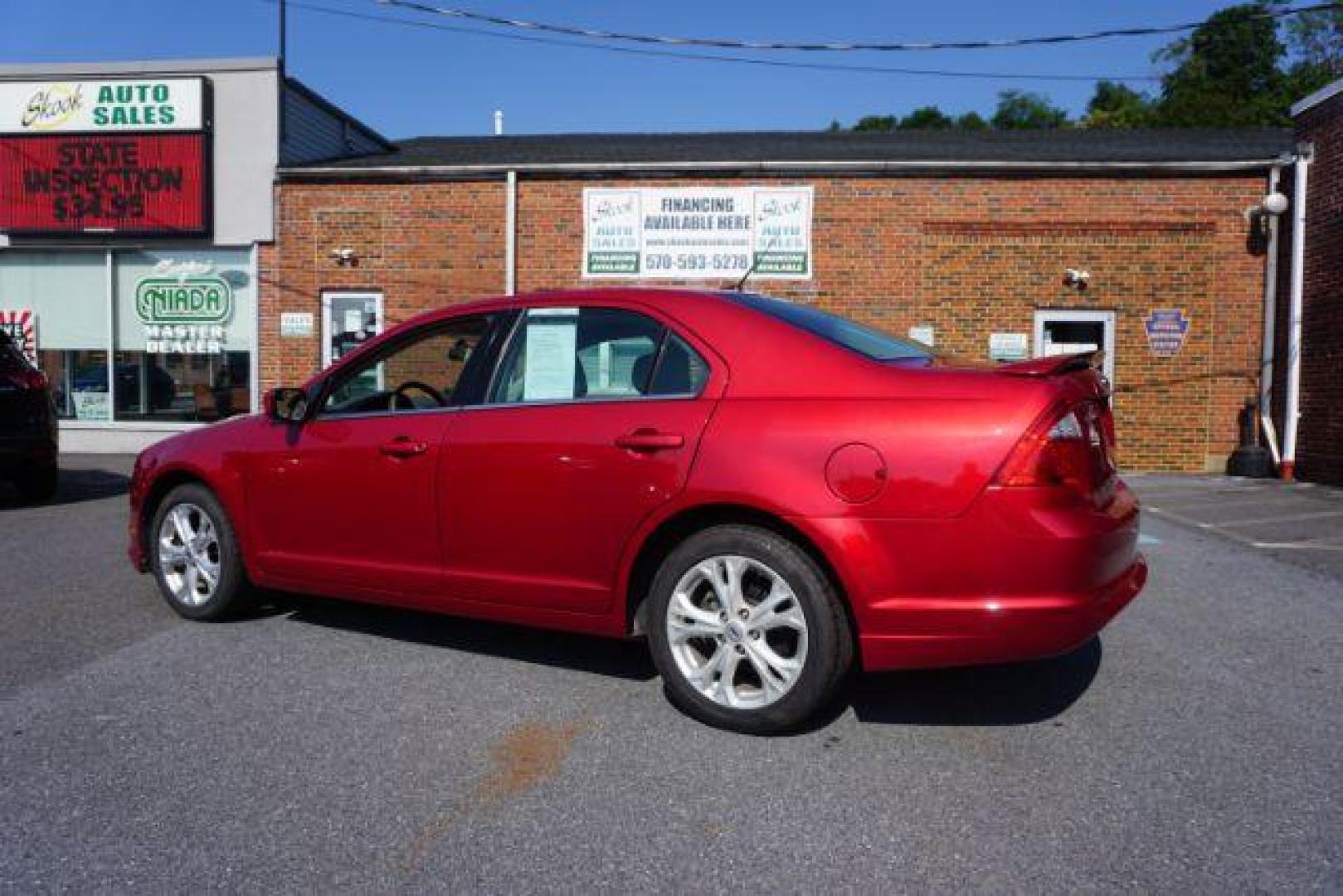 2012 Red Candy Metallic /Medium Light Stone C Ford Fusion SE (3FAHP0HA1CR) with an 2.5L L4 DOHC 16V engine, located at 312 Centre Ave, Schuylkill Haven, PA, 17972, (570) 593-5278, 40.638130, -76.177383 - Photo#11