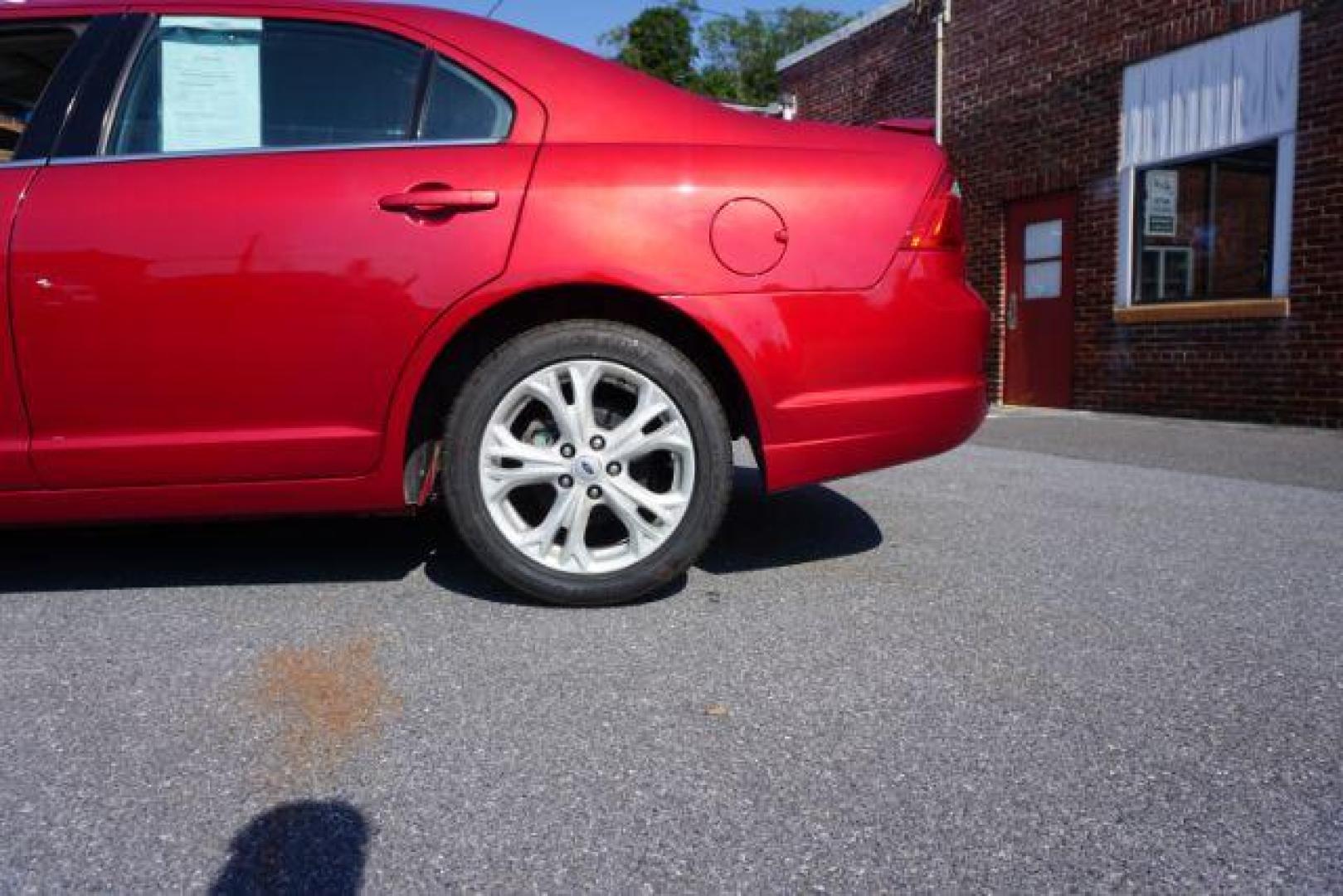 2012 Red Candy Metallic /Medium Light Stone C Ford Fusion SE (3FAHP0HA1CR) with an 2.5L L4 DOHC 16V engine, located at 312 Centre Ave, Schuylkill Haven, PA, 17972, (570) 593-5278, 40.638130, -76.177383 - Photo#12