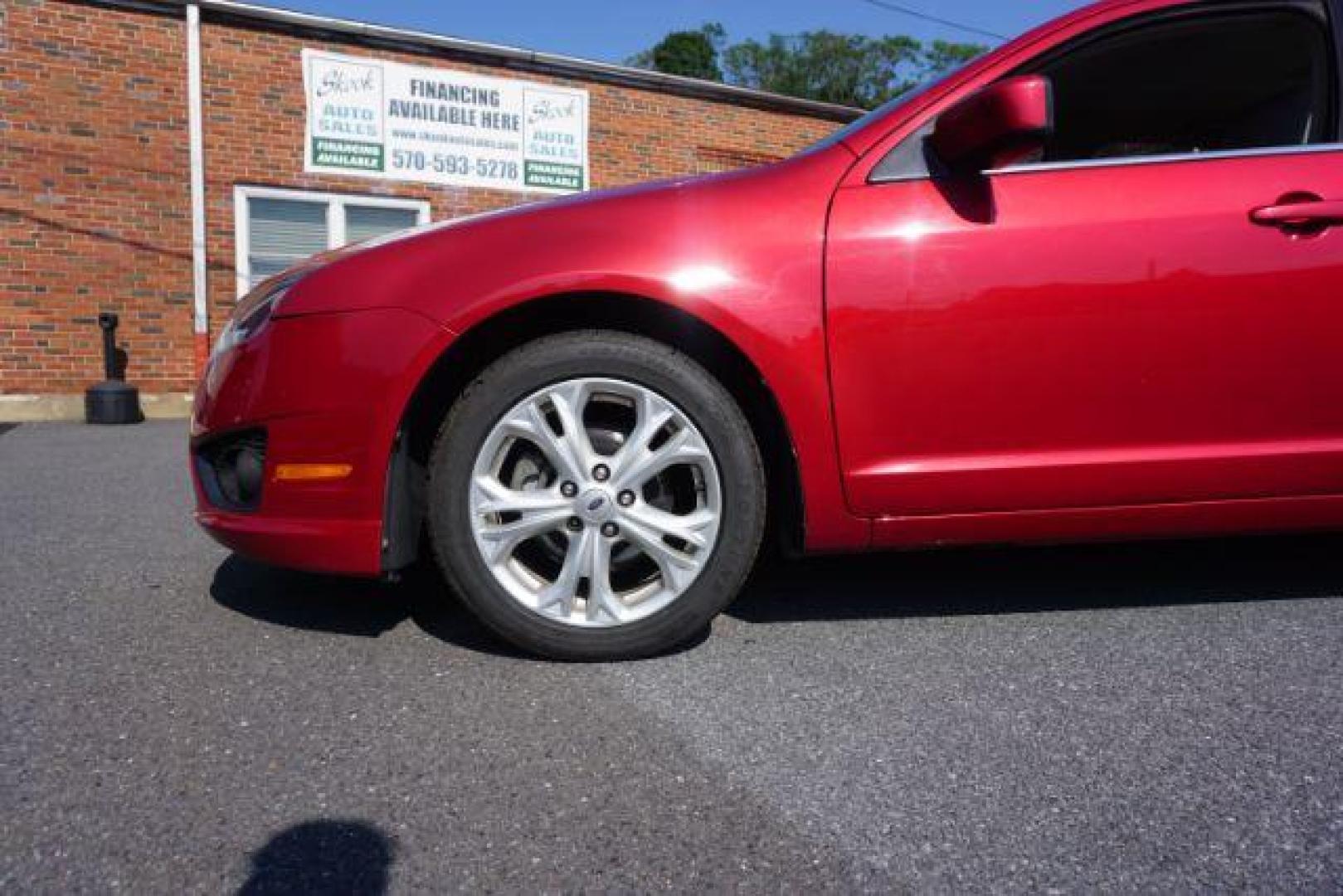 2012 Red Candy Metallic /Medium Light Stone C Ford Fusion SE (3FAHP0HA1CR) with an 2.5L L4 DOHC 16V engine, located at 312 Centre Ave, Schuylkill Haven, PA, 17972, (570) 593-5278, 40.638130, -76.177383 - Photo#13