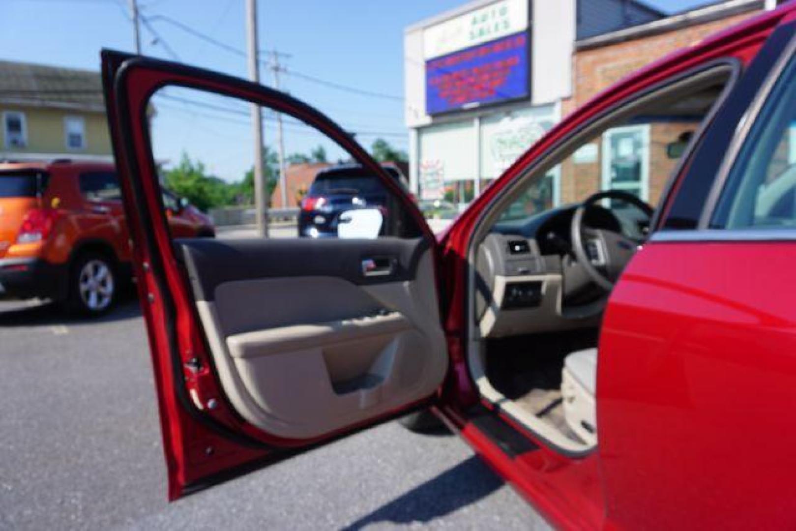 2012 Red Candy Metallic /Medium Light Stone C Ford Fusion SE (3FAHP0HA1CR) with an 2.5L L4 DOHC 16V engine, located at 312 Centre Ave, Schuylkill Haven, PA, 17972, (570) 593-5278, 40.638130, -76.177383 - Photo#15