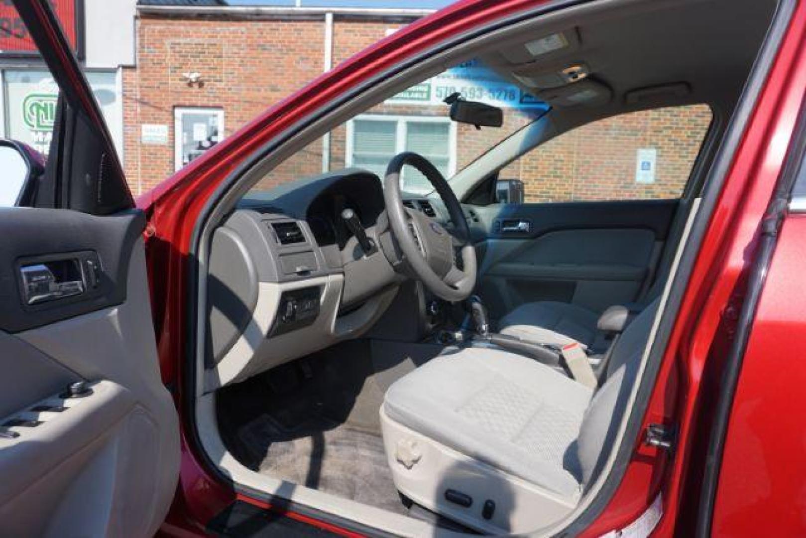 2012 Red Candy Metallic /Medium Light Stone C Ford Fusion SE (3FAHP0HA1CR) with an 2.5L L4 DOHC 16V engine, located at 312 Centre Ave, Schuylkill Haven, PA, 17972, (570) 593-5278, 40.638130, -76.177383 - Photo#18