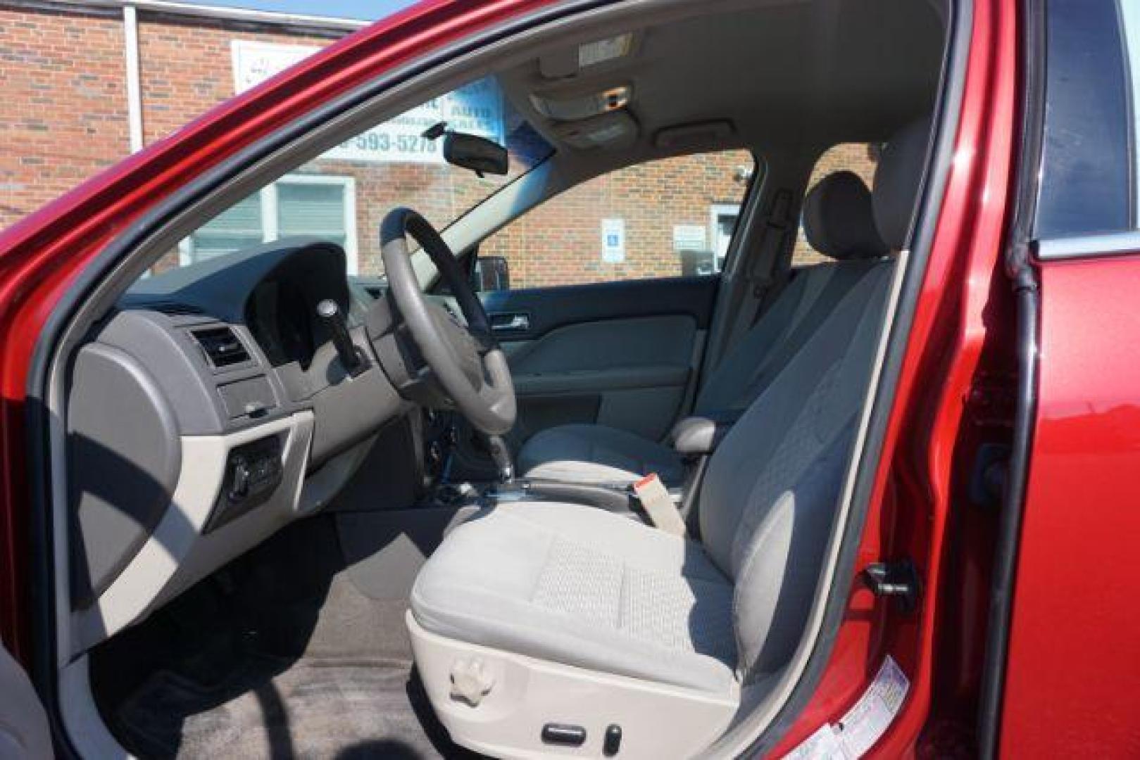 2012 Red Candy Metallic /Medium Light Stone C Ford Fusion SE (3FAHP0HA1CR) with an 2.5L L4 DOHC 16V engine, located at 312 Centre Ave, Schuylkill Haven, PA, 17972, (570) 593-5278, 40.638130, -76.177383 - Photo#19