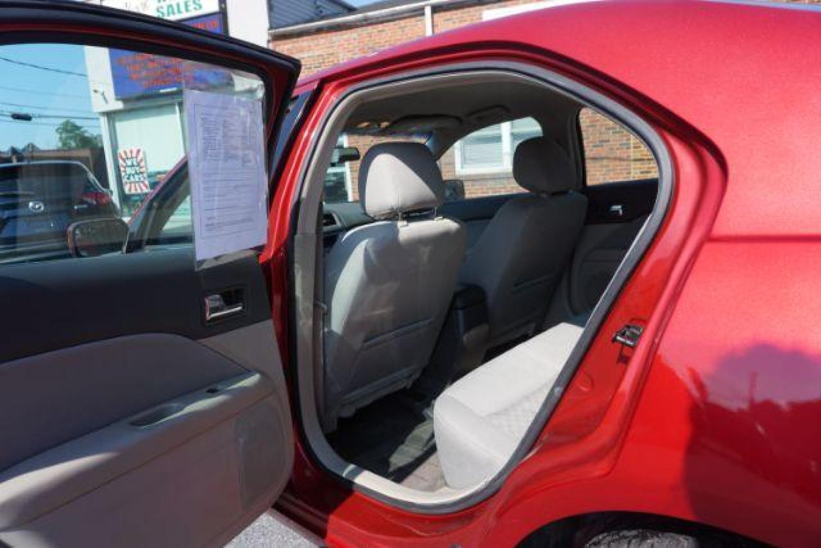 2012 Red Candy Metallic /Medium Light Stone C Ford Fusion SE (3FAHP0HA1CR) with an 2.5L L4 DOHC 16V engine, located at 312 Centre Ave, Schuylkill Haven, PA, 17972, (570) 593-5278, 40.638130, -76.177383 - Photo#30