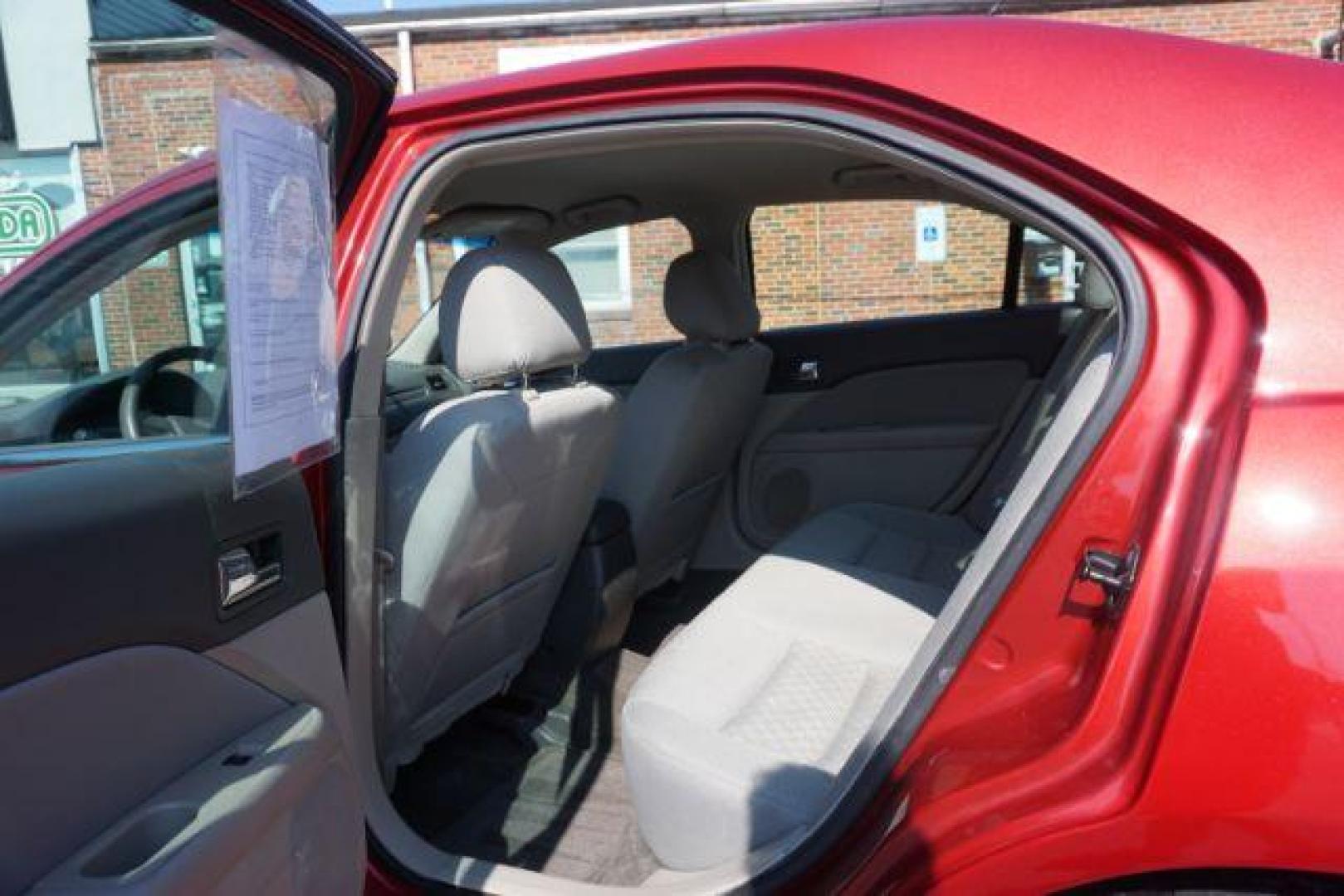 2012 Red Candy Metallic /Medium Light Stone C Ford Fusion SE (3FAHP0HA1CR) with an 2.5L L4 DOHC 16V engine, located at 312 Centre Ave, Schuylkill Haven, PA, 17972, (570) 593-5278, 40.638130, -76.177383 - Photo#31