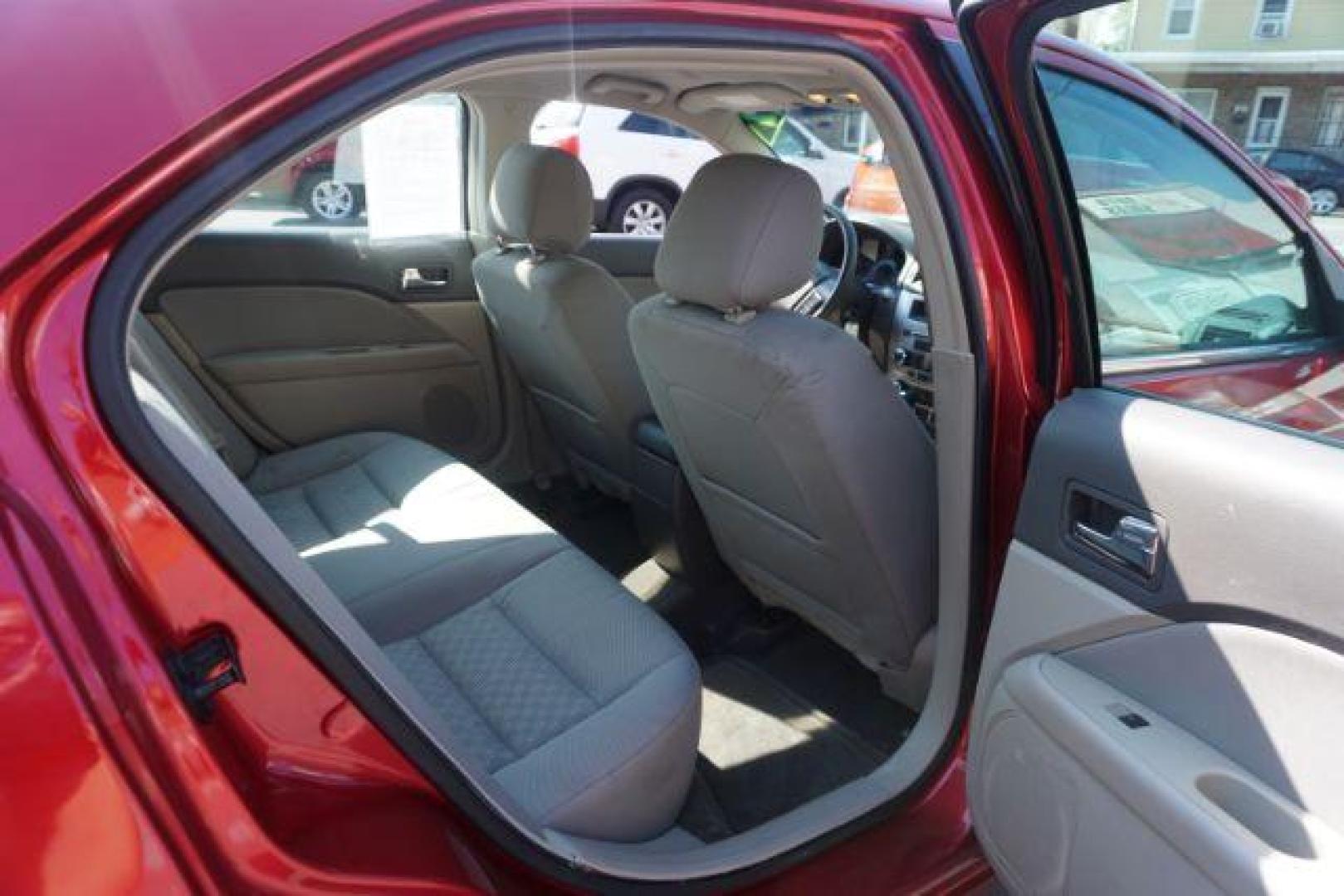 2012 Red Candy Metallic /Medium Light Stone C Ford Fusion SE (3FAHP0HA1CR) with an 2.5L L4 DOHC 16V engine, located at 312 Centre Ave, Schuylkill Haven, PA, 17972, (570) 593-5278, 40.638130, -76.177383 - Photo#42