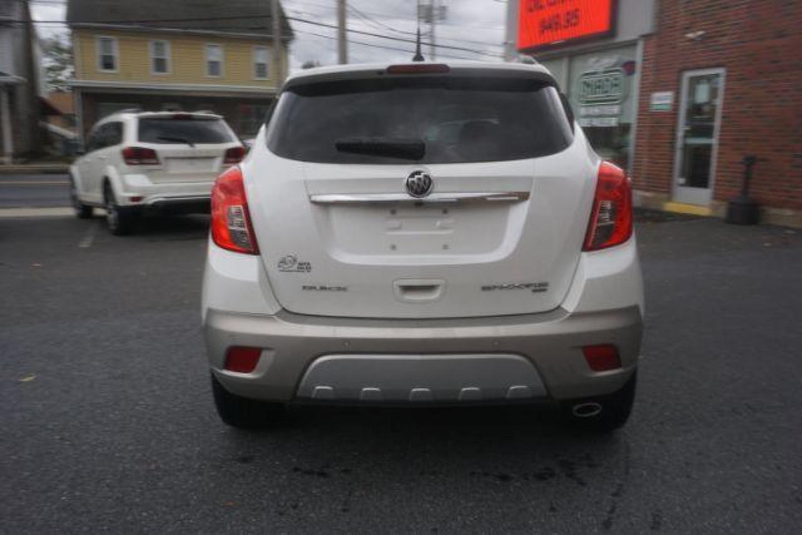 2014 White Pearl Tricoat Buick Encore Premium AWD (KL4CJHSB1EB) with an 1.4L L4 DOHC 16V TURBO engine, 6-Speed Automatic transmission, located at 312 Centre Ave, Schuylkill Haven, PA, 17972, (570) 593-5278, 40.638130, -76.177383 - navigation system, power sunroof, bose premium stereo - Photo#12