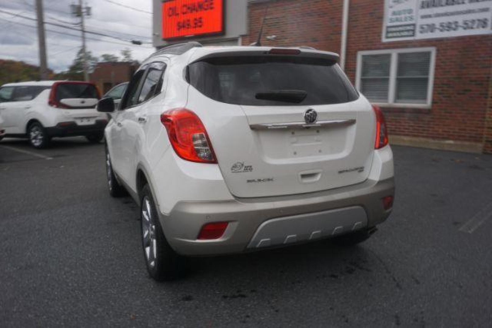 2014 White Pearl Tricoat Buick Encore Premium AWD (KL4CJHSB1EB) with an 1.4L L4 DOHC 16V TURBO engine, 6-Speed Automatic transmission, located at 312 Centre Ave, Schuylkill Haven, PA, 17972, (570) 593-5278, 40.638130, -76.177383 - navigation system, power sunroof, bose premium stereo - Photo#13