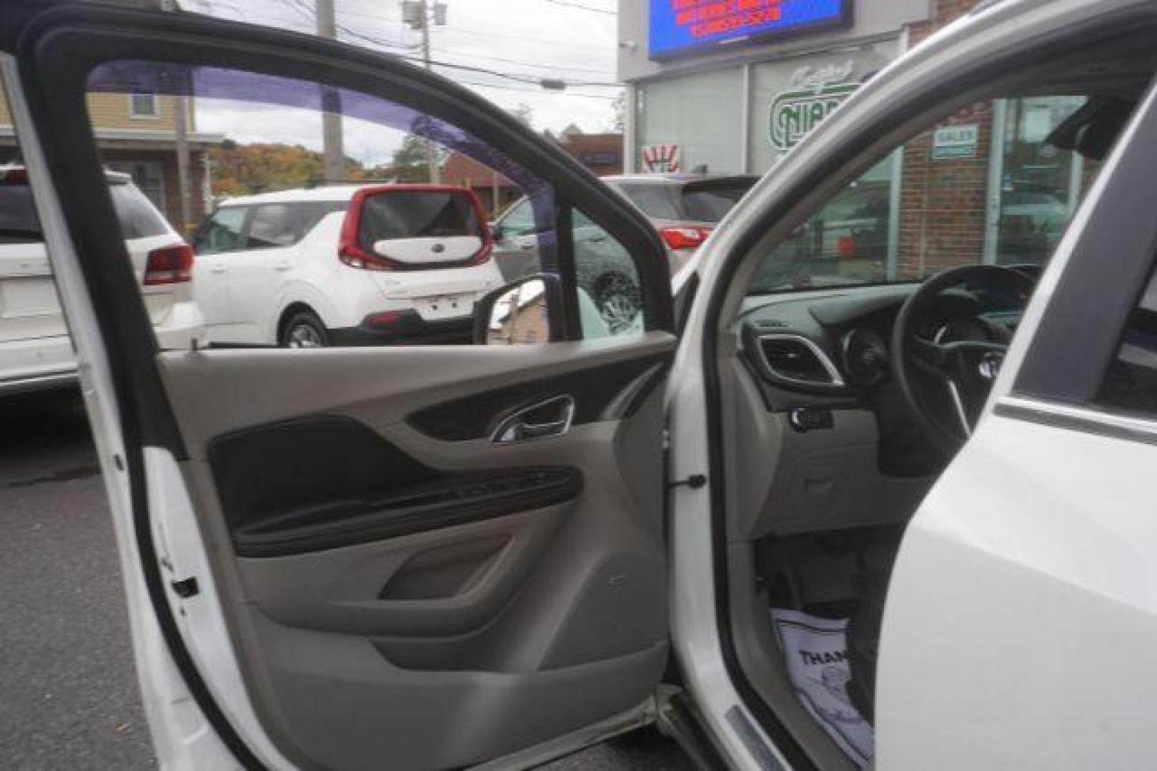 2014 White Pearl Tricoat Buick Encore Premium AWD (KL4CJHSB1EB) with an 1.4L L4 DOHC 16V TURBO engine, 6-Speed Automatic transmission, located at 312 Centre Ave, Schuylkill Haven, PA, 17972, (570) 593-5278, 40.638130, -76.177383 - navigation system, power sunroof, bose premium stereo - Photo#18