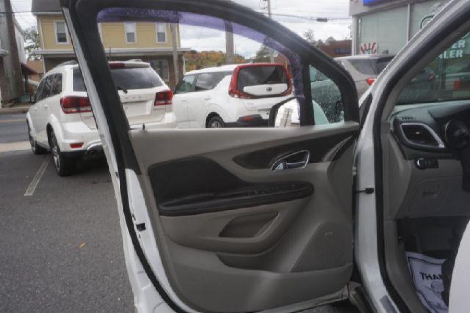 2014 White Pearl Tricoat Buick Encore Premium AWD (KL4CJHSB1EB) with an 1.4L L4 DOHC 16V TURBO engine, 6-Speed Automatic transmission, located at 312 Centre Ave, Schuylkill Haven, PA, 17972, (570) 593-5278, 40.638130, -76.177383 - navigation system, power sunroof, bose premium stereo - Photo#19