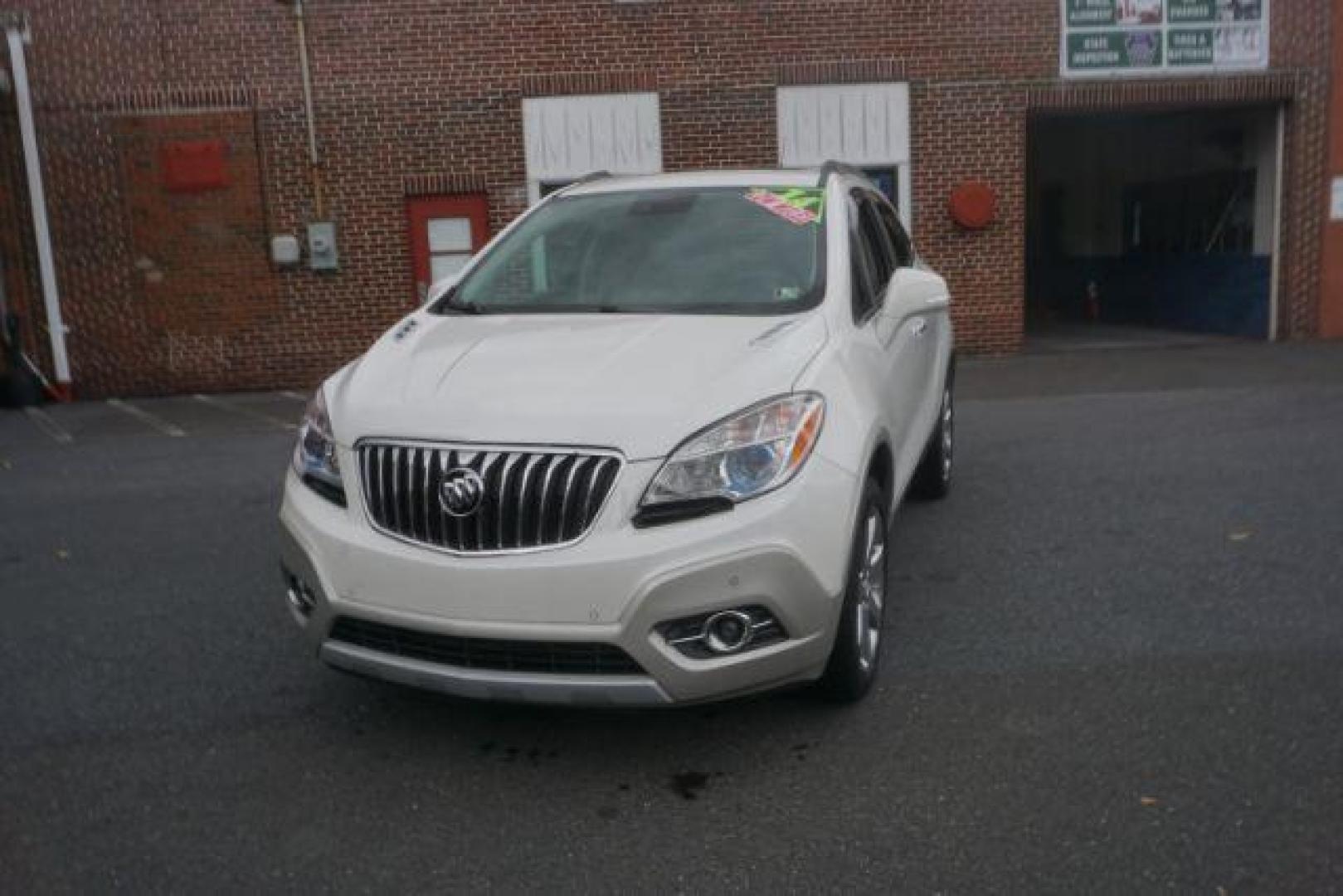 2014 White Pearl Tricoat Buick Encore Premium AWD (KL4CJHSB1EB) with an 1.4L L4 DOHC 16V TURBO engine, 6-Speed Automatic transmission, located at 312 Centre Ave, Schuylkill Haven, PA, 17972, (570) 593-5278, 40.638130, -76.177383 - navigation system, power sunroof, bose premium stereo - Photo#3