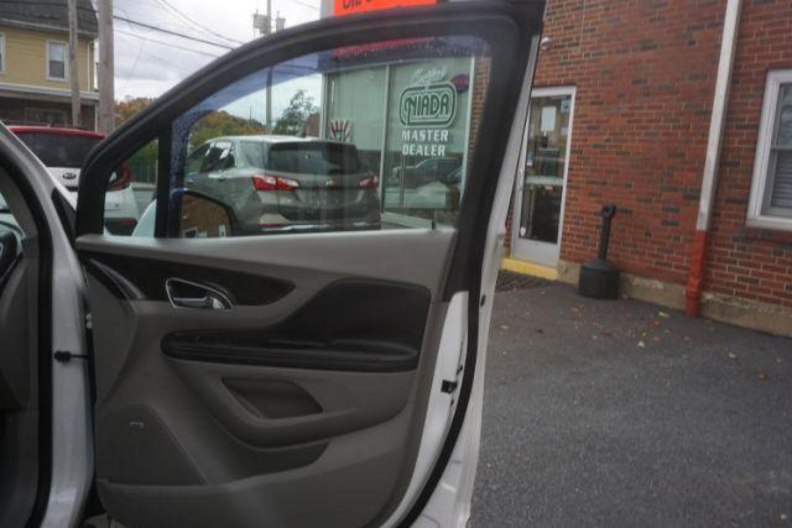 2014 White Pearl Tricoat Buick Encore Premium AWD (KL4CJHSB1EB) with an 1.4L L4 DOHC 16V TURBO engine, 6-Speed Automatic transmission, located at 312 Centre Ave, Schuylkill Haven, PA, 17972, (570) 593-5278, 40.638130, -76.177383 - navigation system, power sunroof, bose premium stereo - Photo#51